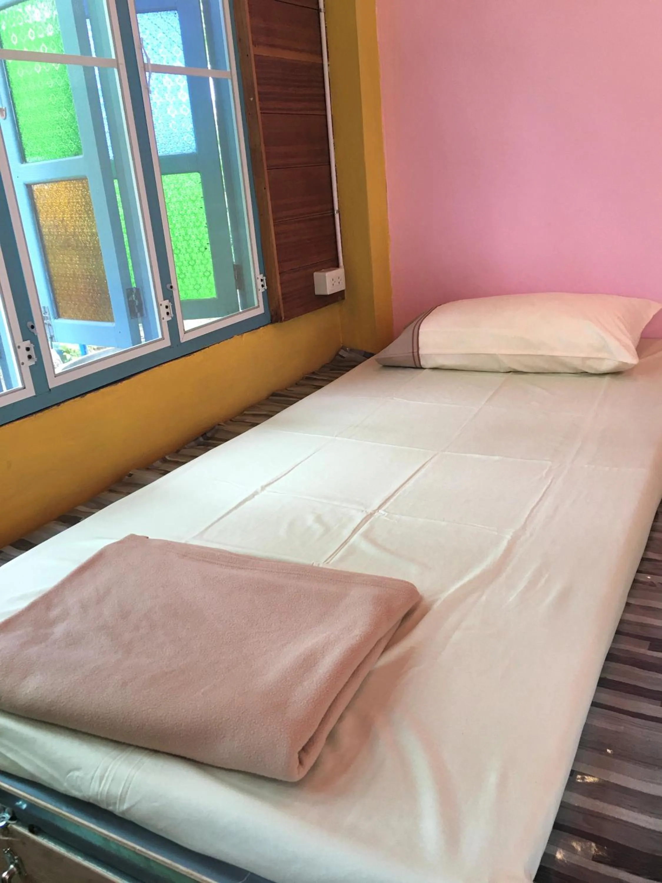 Bed in Pai Flora Resort