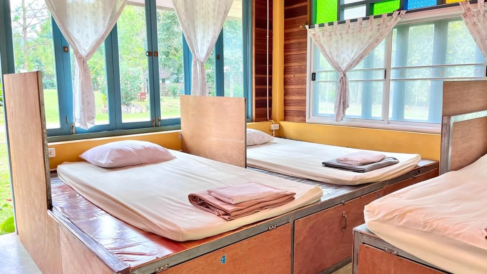Bed in Pai Flora Resort