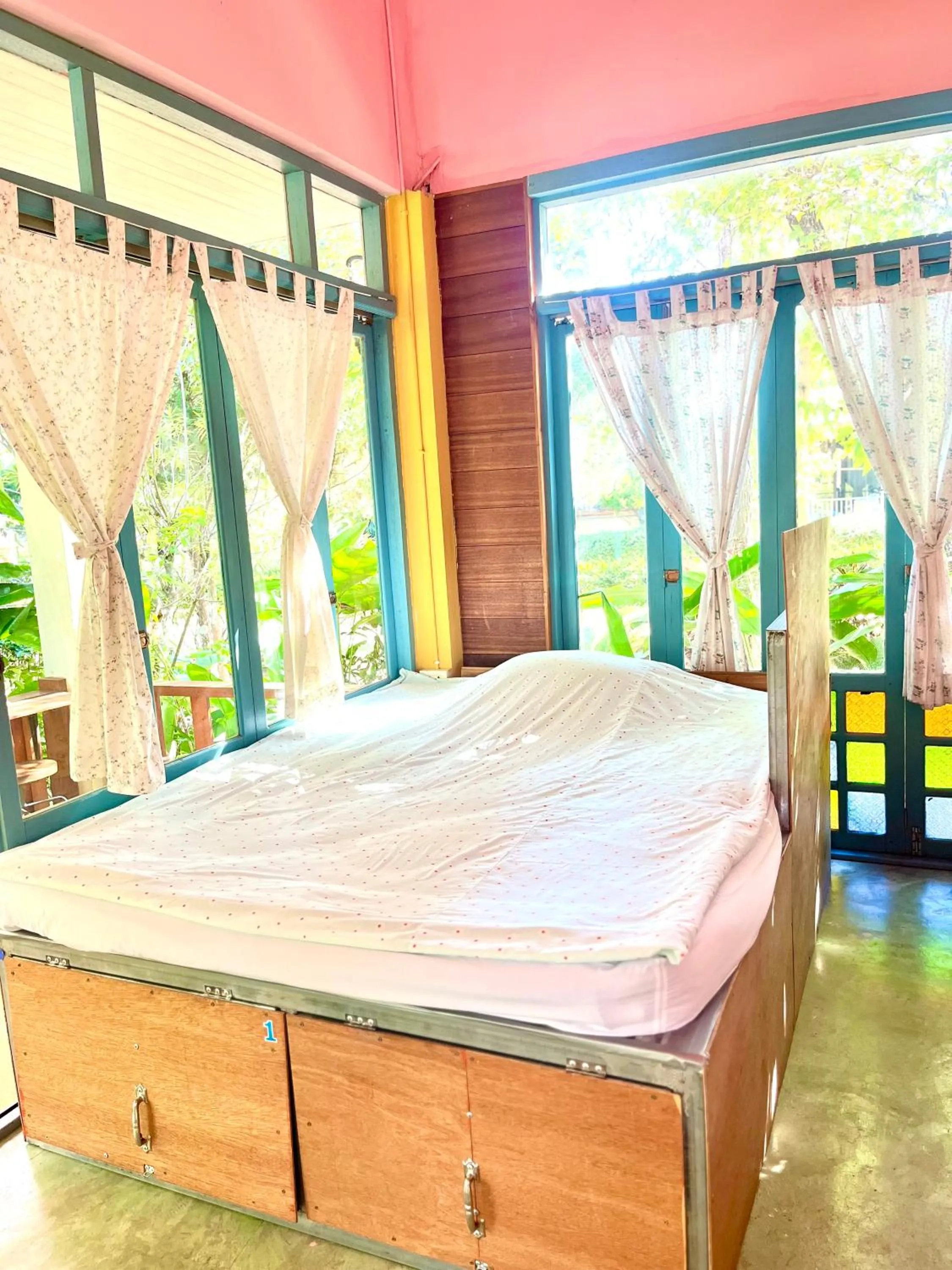 Bed in Pai Flora Resort