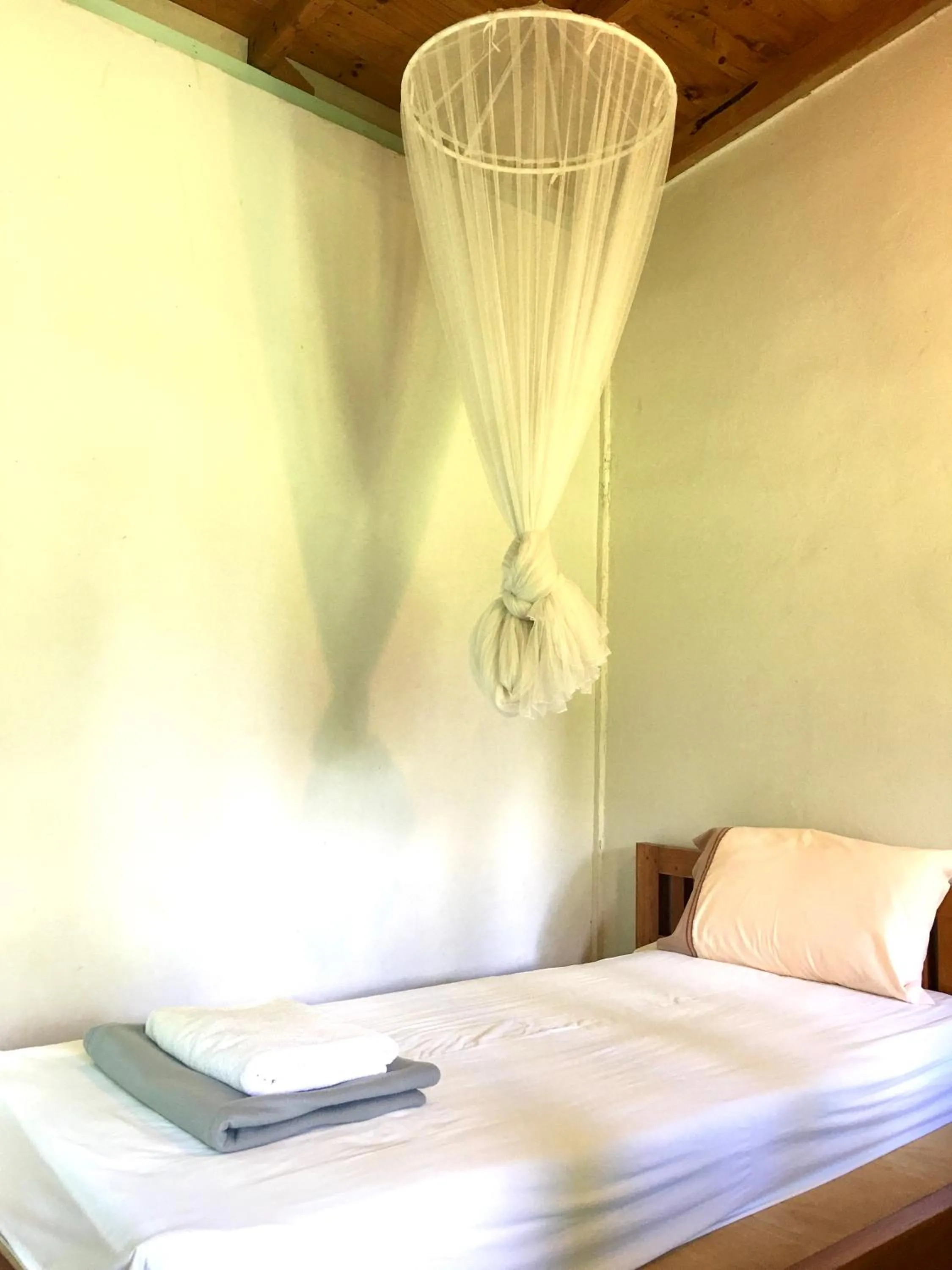 Bed in Pai Flora Resort