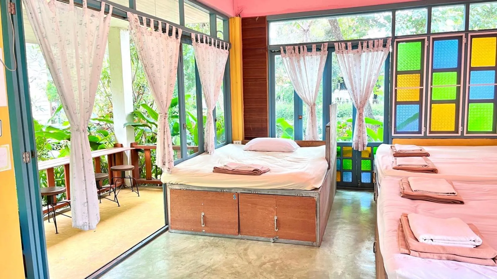 Bed in Pai Flora Resort