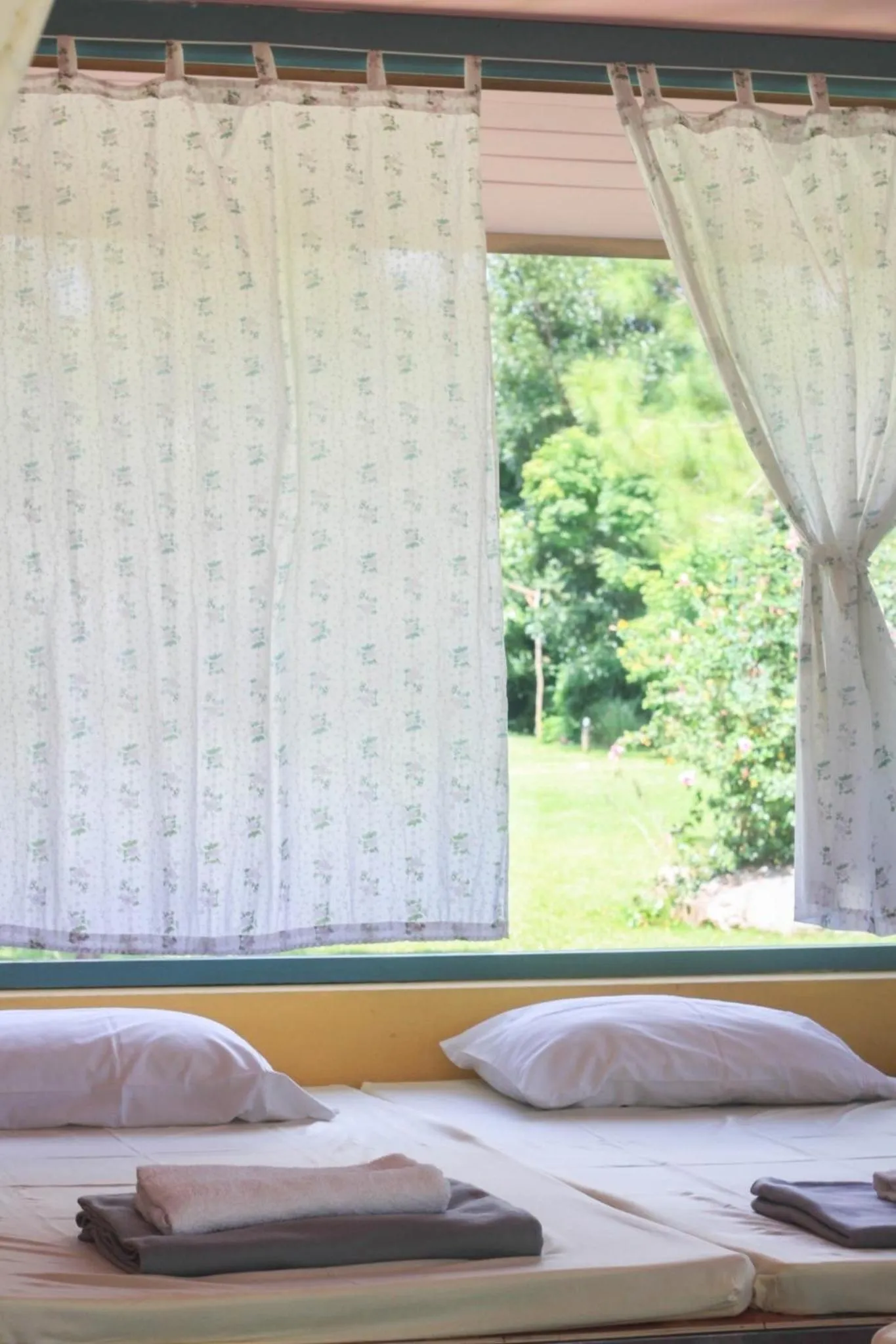 Bed in Pai Flora Resort