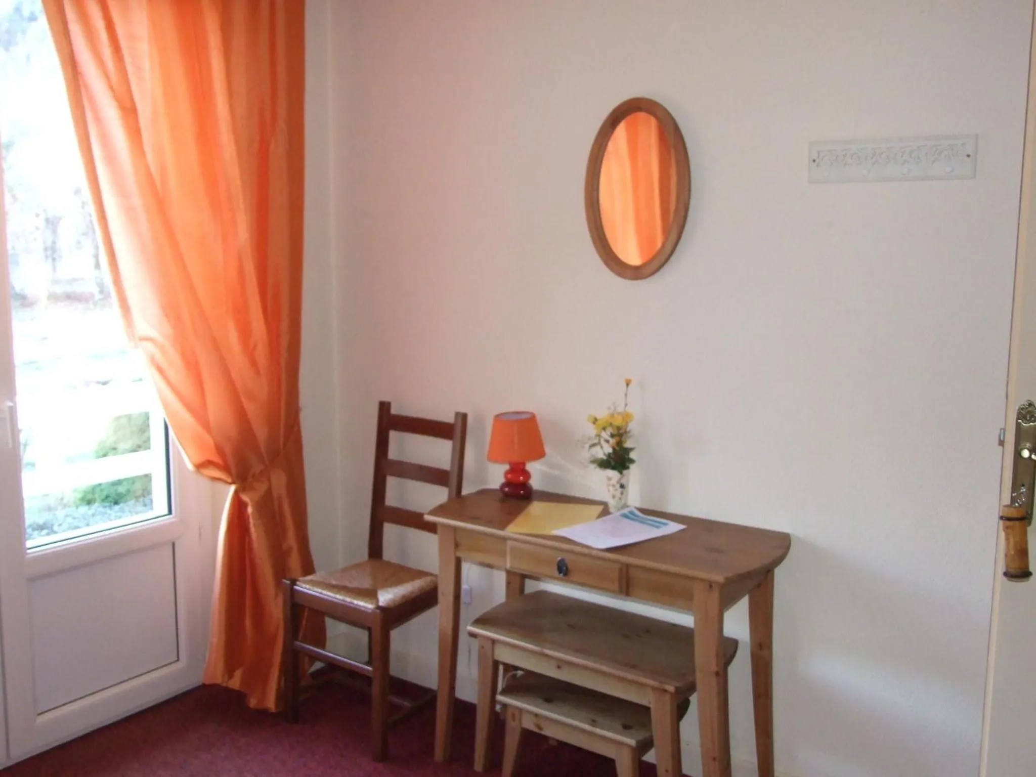 Seating area in Hôtel du Val d'Aure