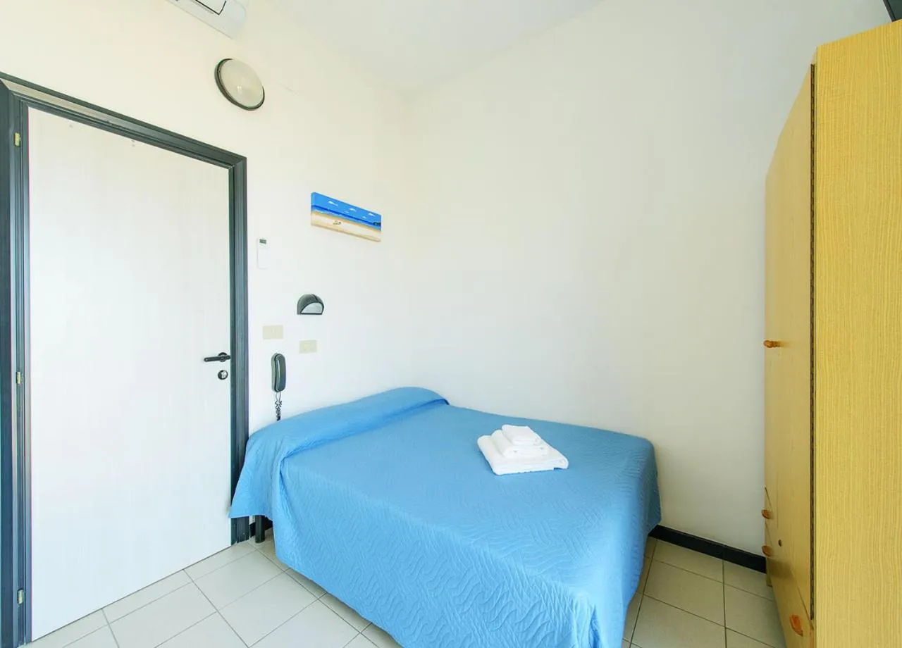 Bed in Hotel Paloma Beach Front Chiringuitos Time