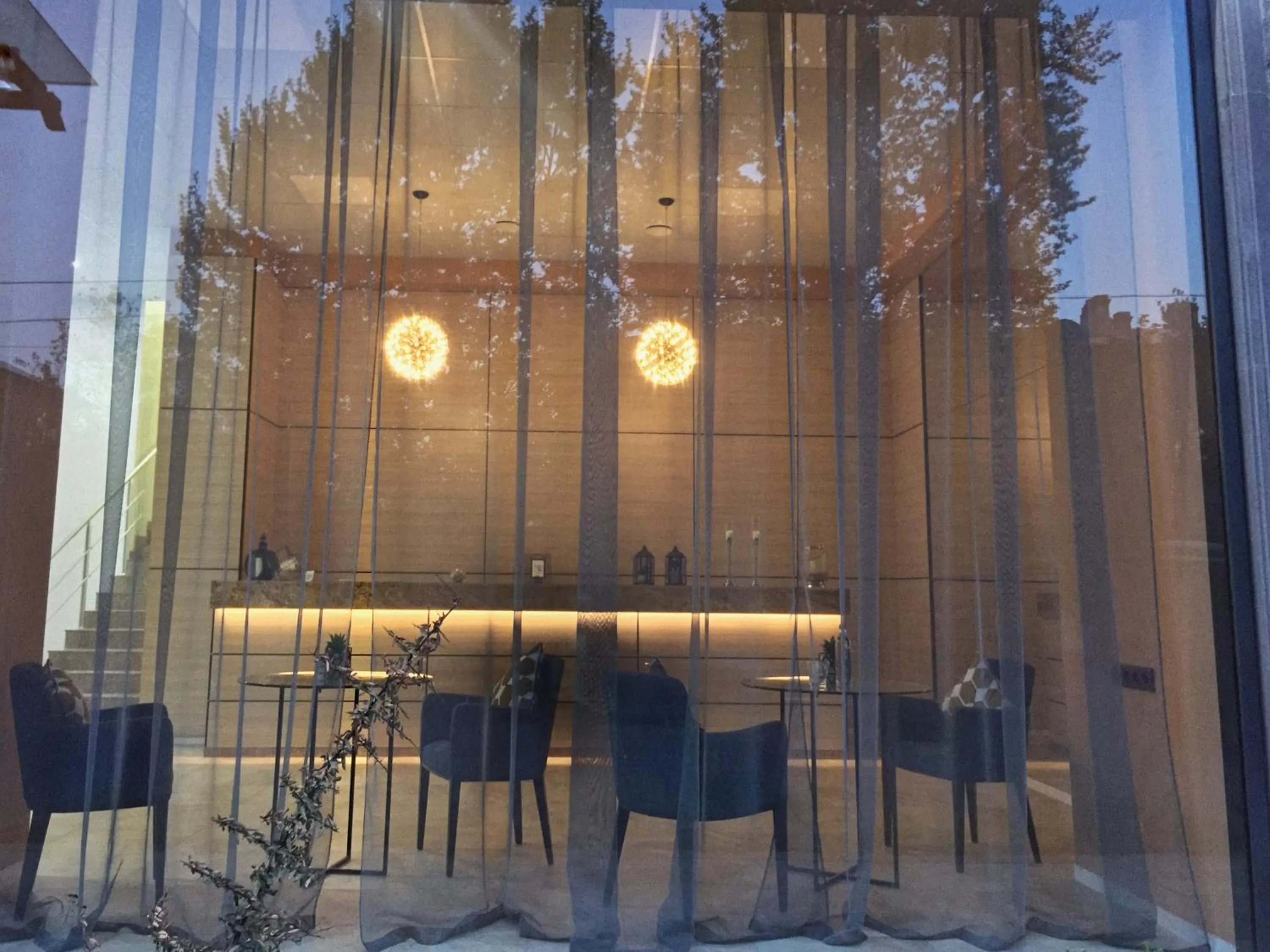 Communal lounge/ TV room in 4Guest Hotel