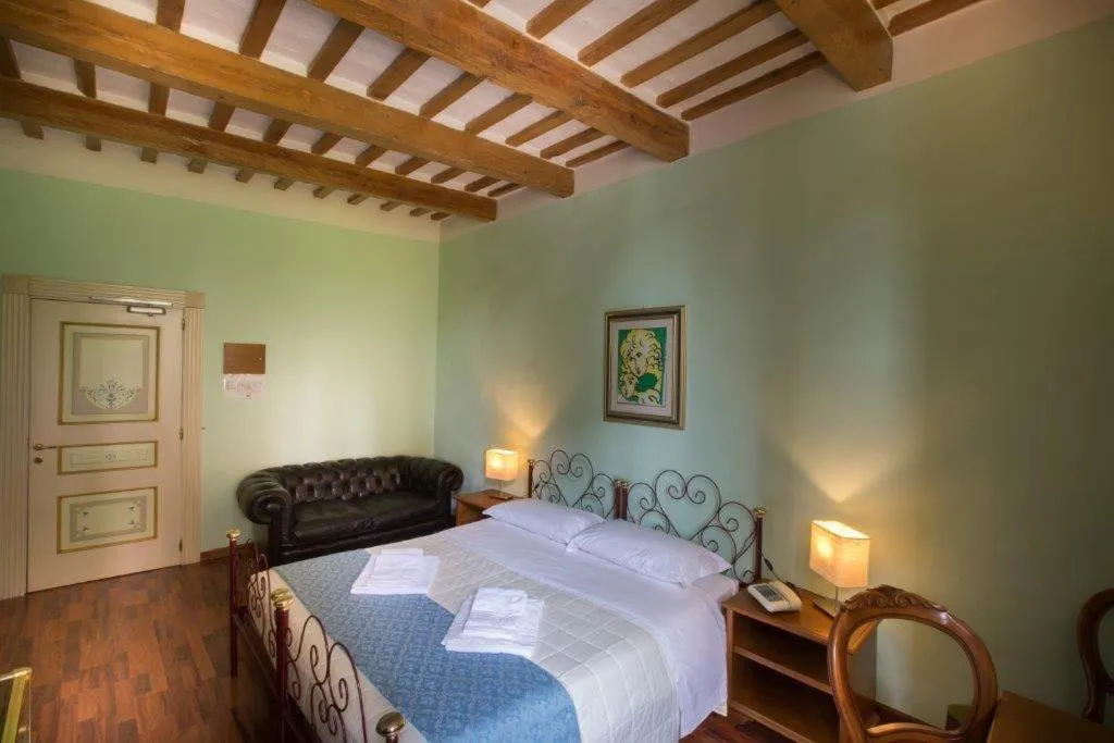 Bed in Hotel Camerlengo