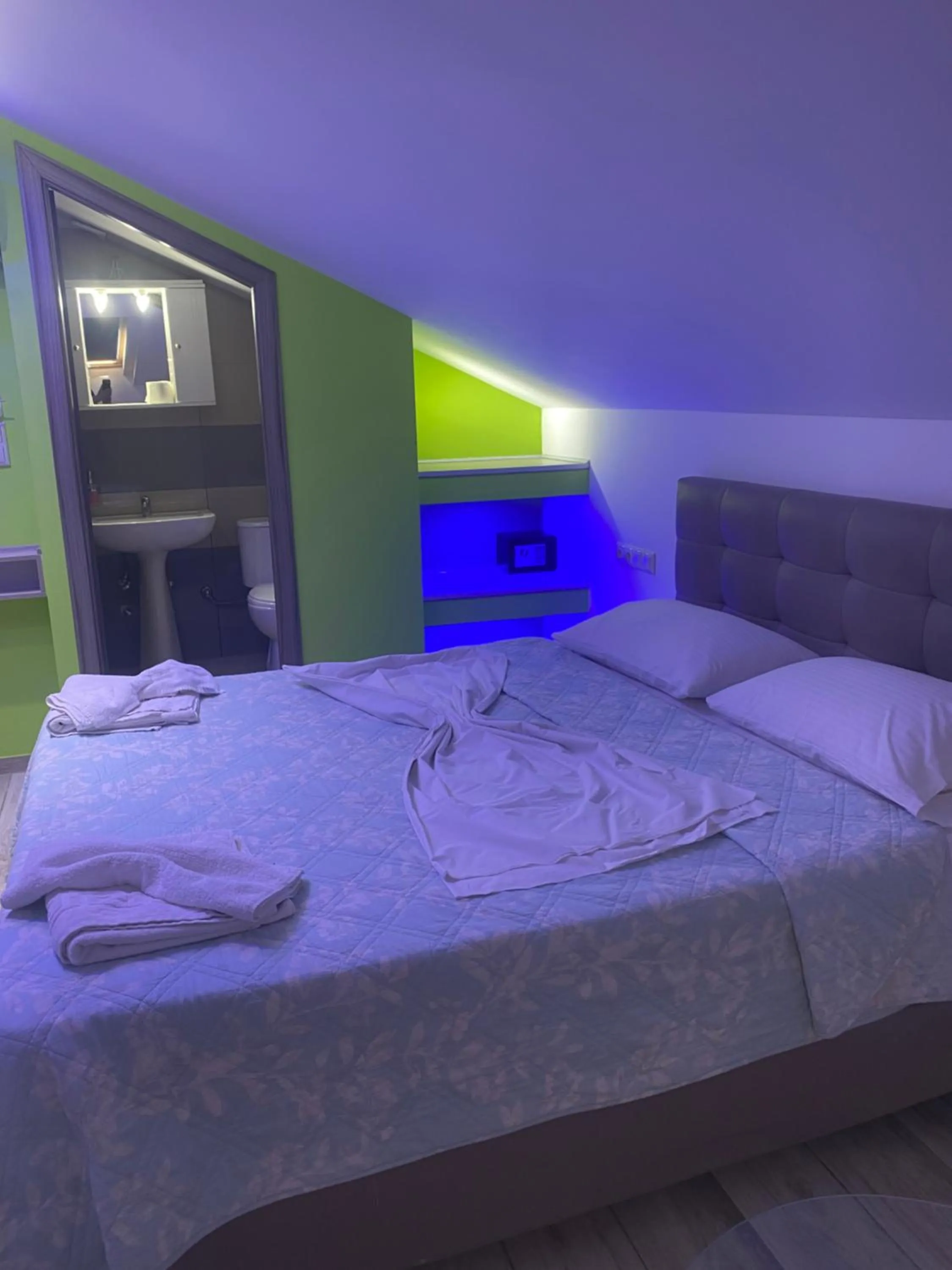 Bed in Blue Sky Apartments