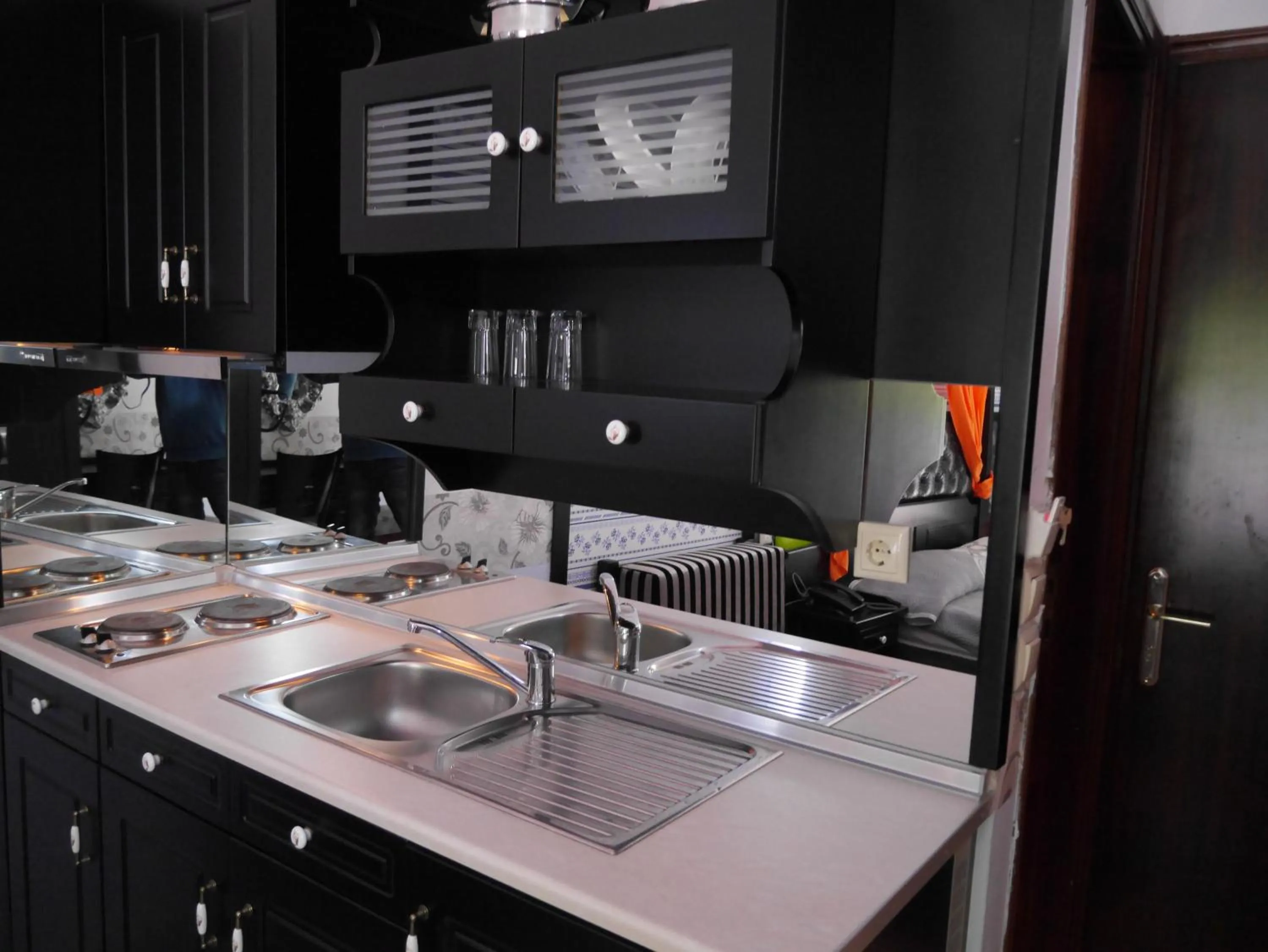 Kitchen or kitchenette in Blue Sky Apartments