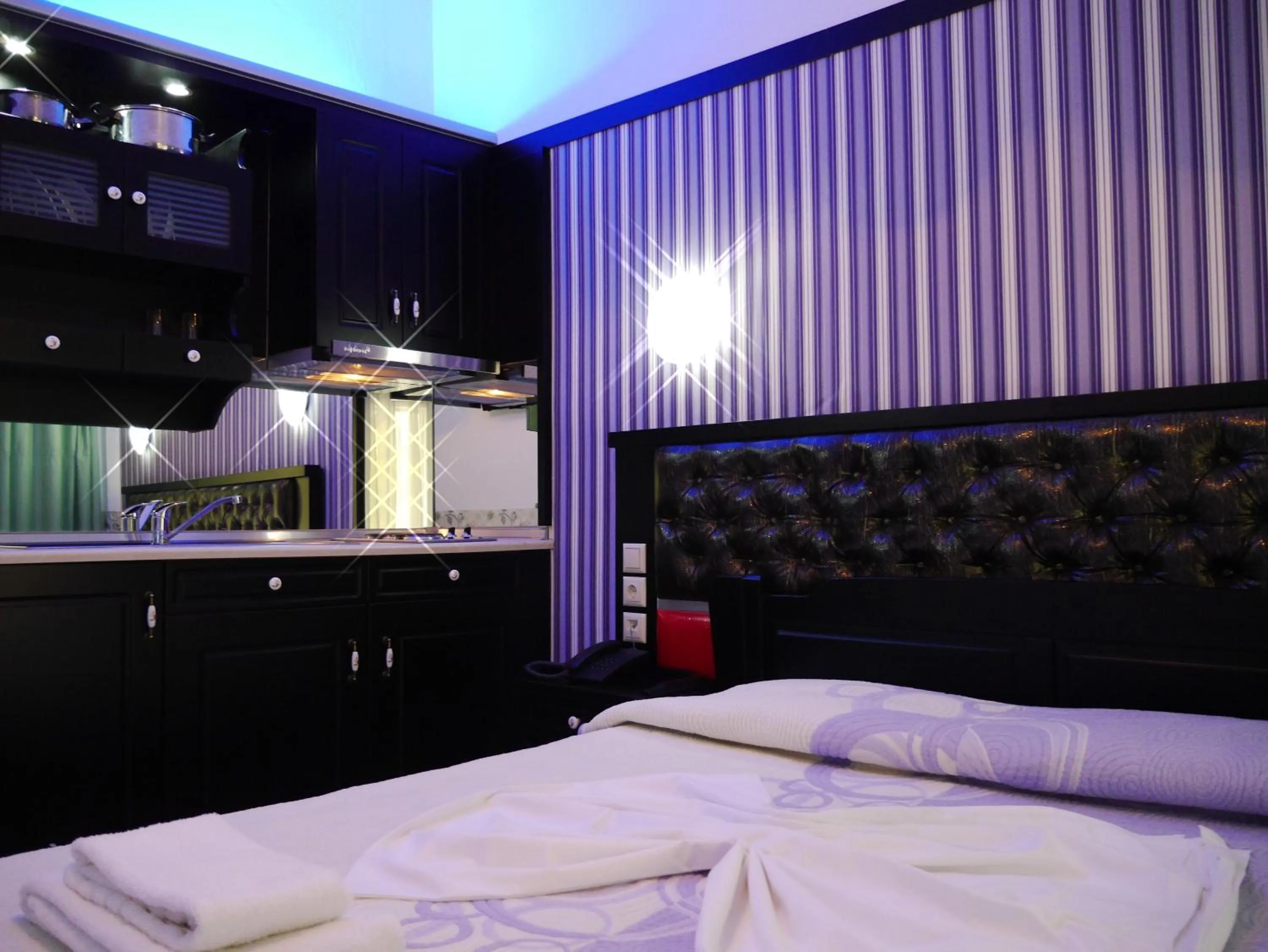 TV and multimedia, Bed in Blue Sky Apartments