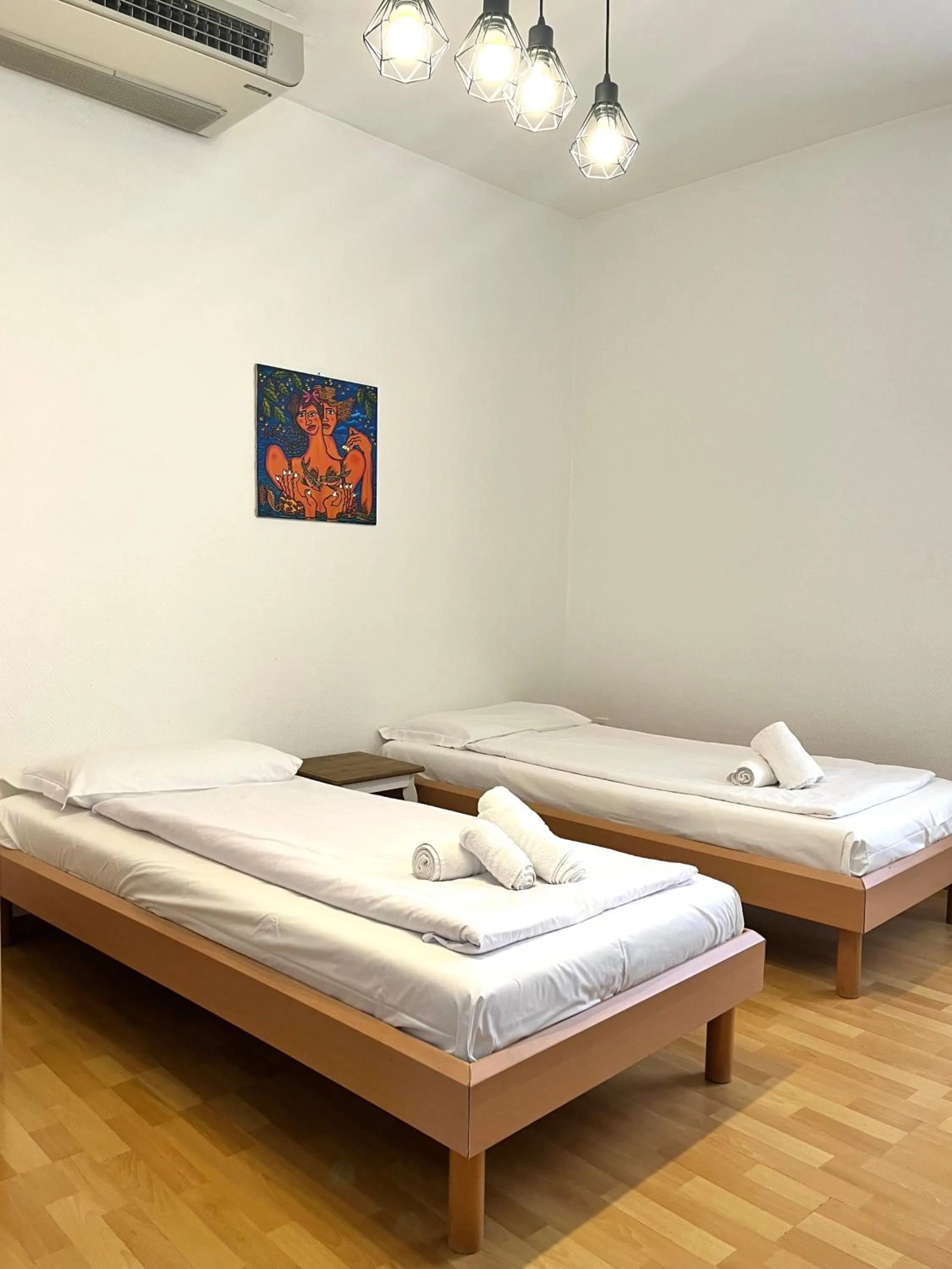 Bed in GuestHouse Lugano Center by LR