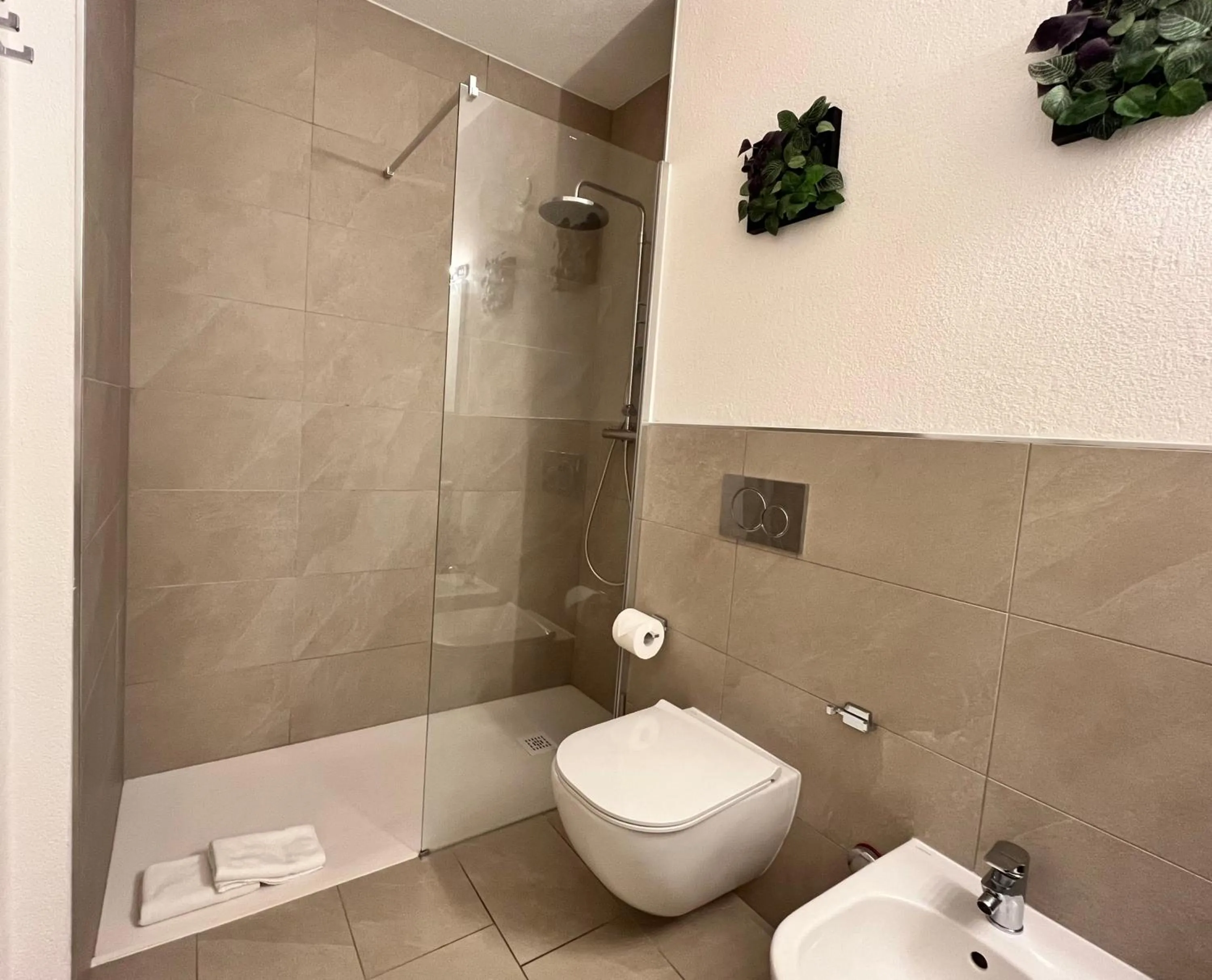 Bathroom in GuestHouse Lugano Center by LR