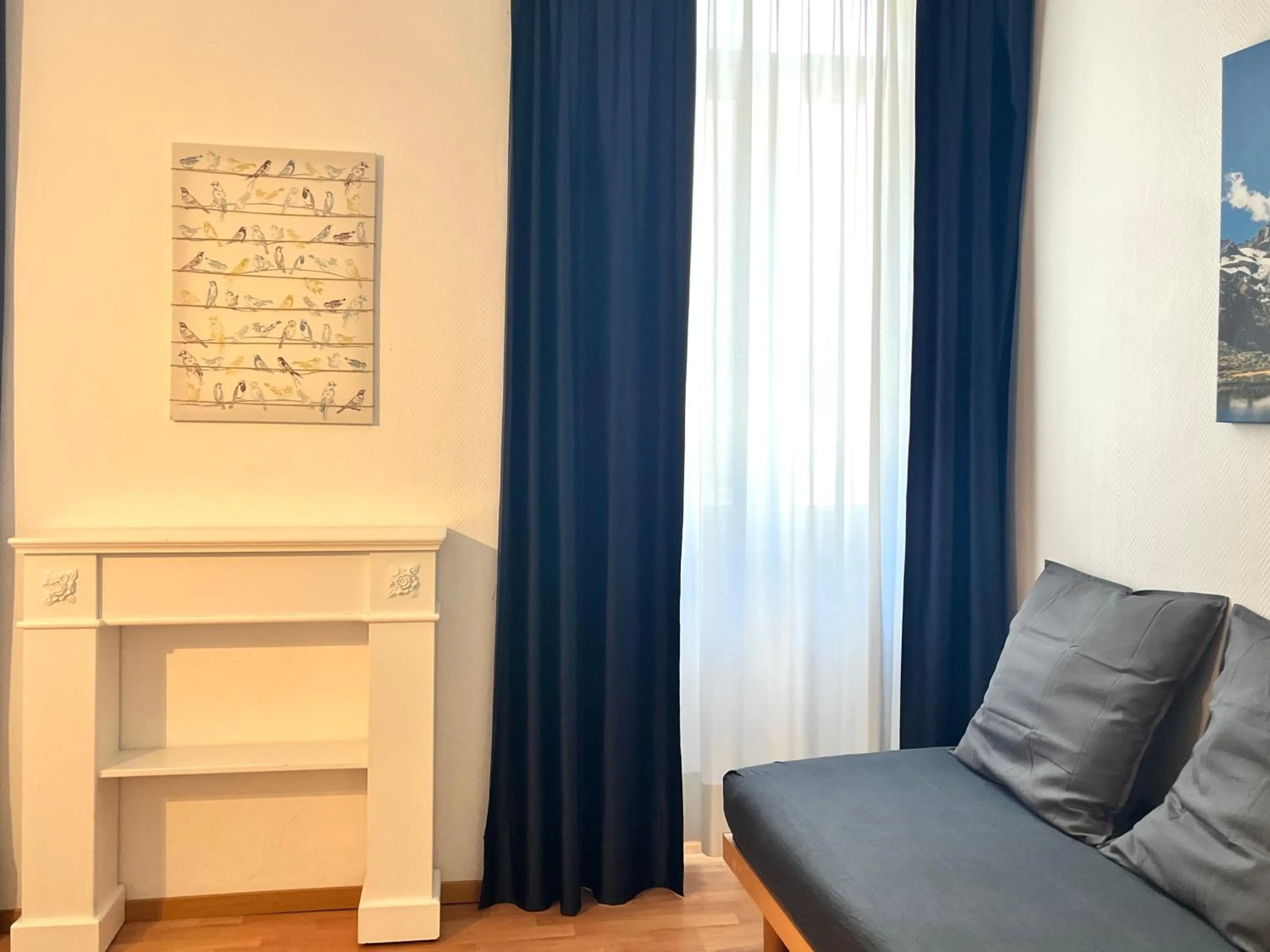 Living room in GuestHouse Lugano Center by LR