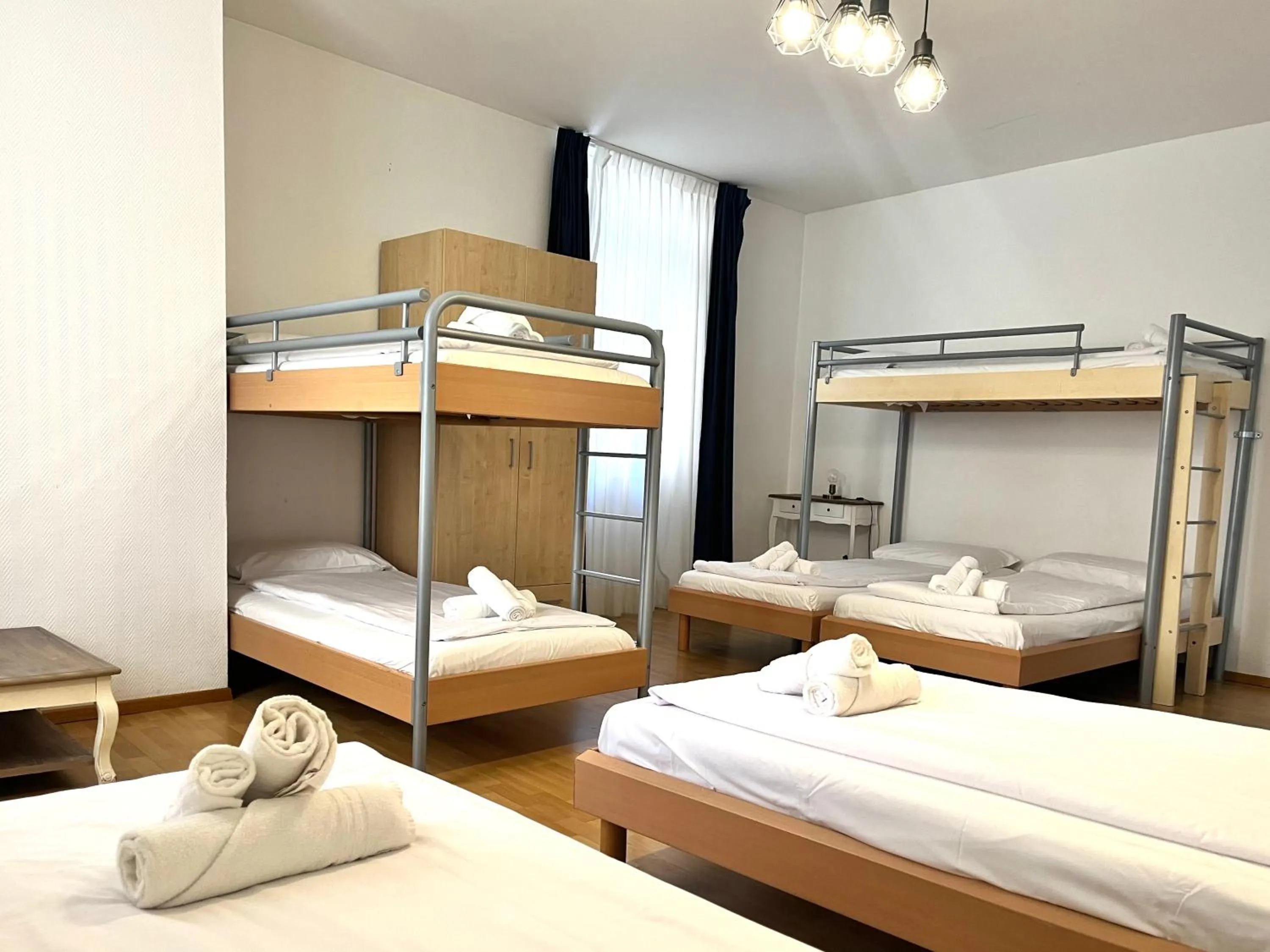 Bed in GuestHouse Lugano Center by LR