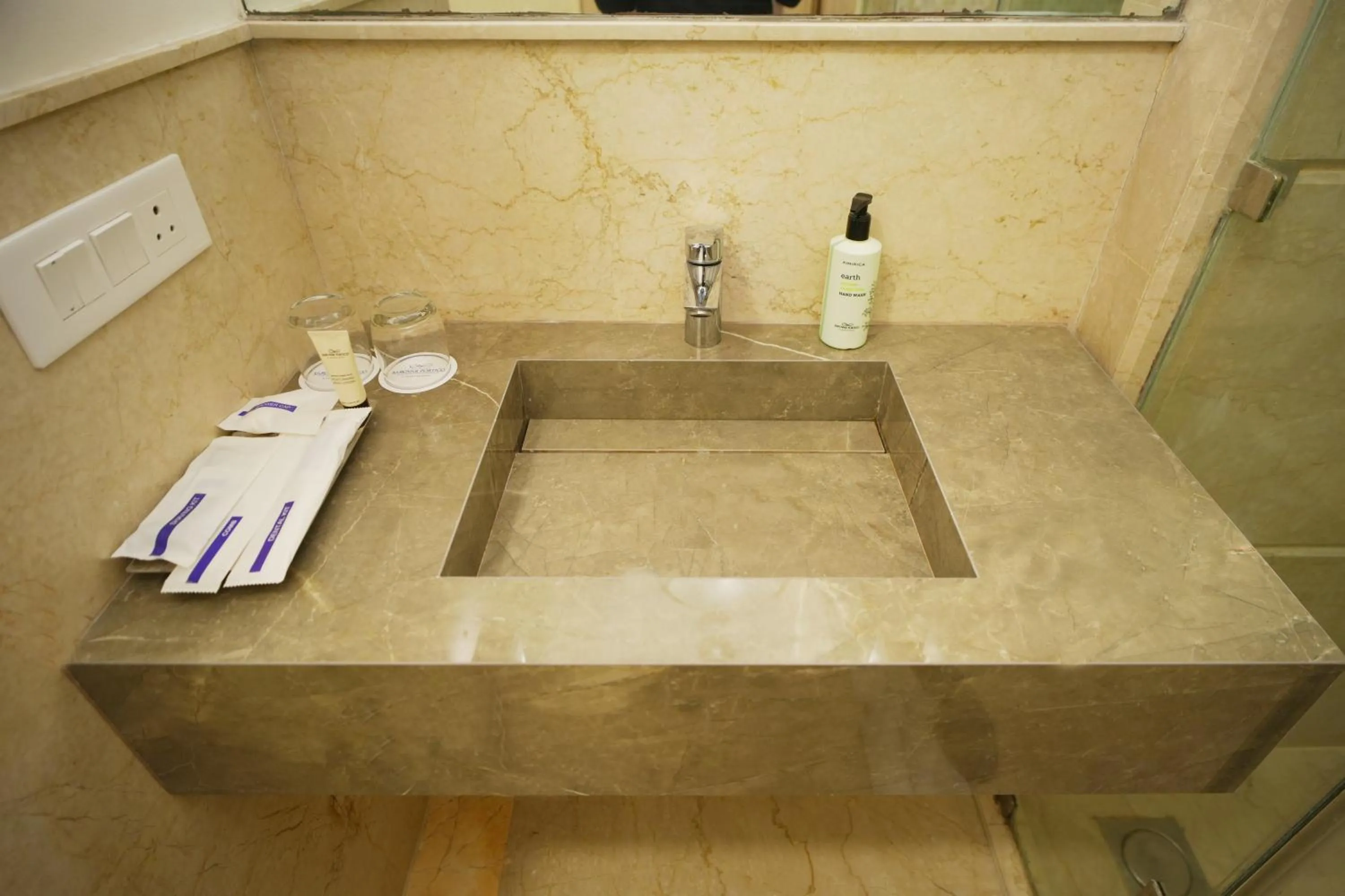 Bathroom in Muse Sarovar Portico Nehru Place