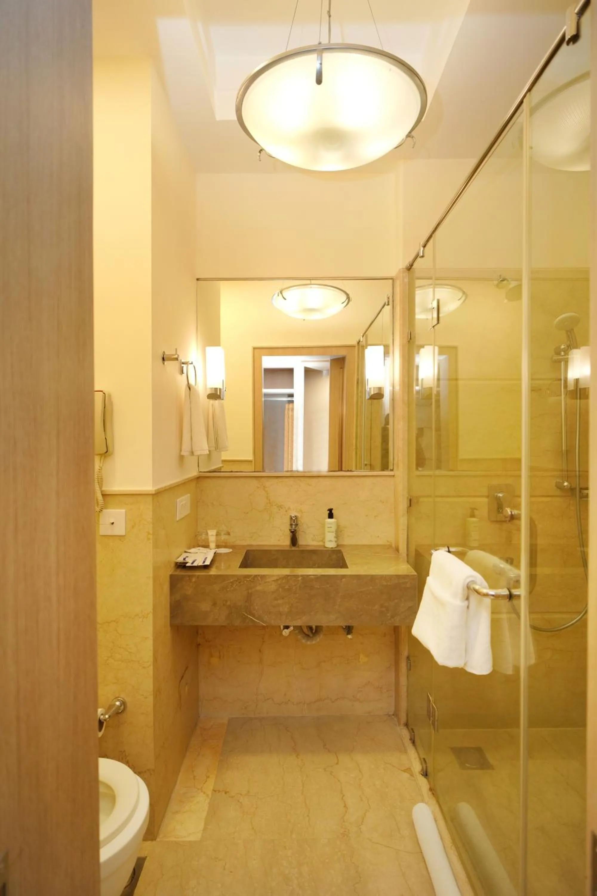 Bathroom in Muse Sarovar Portico Nehru Place