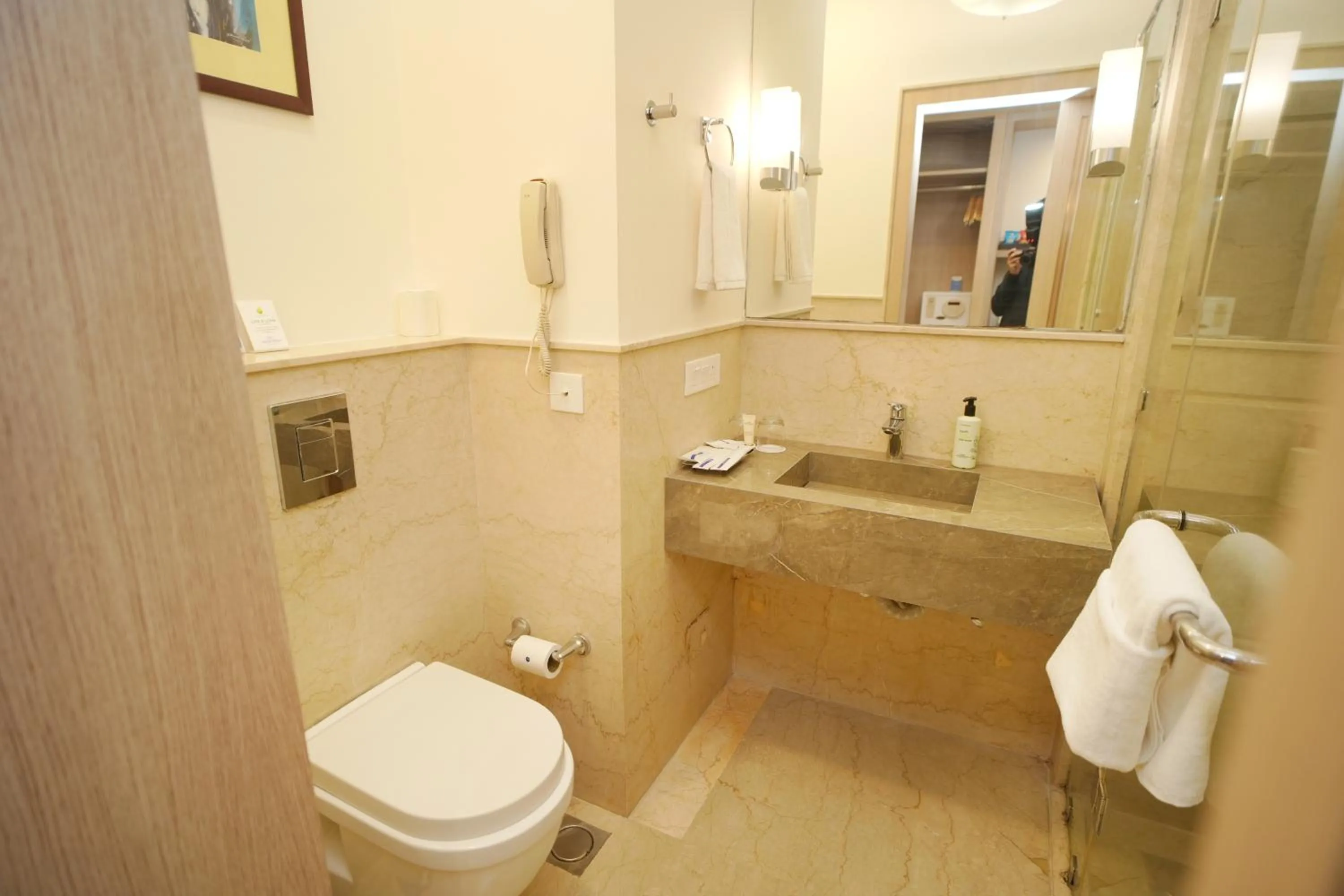 Bathroom in Muse Sarovar Portico Nehru Place