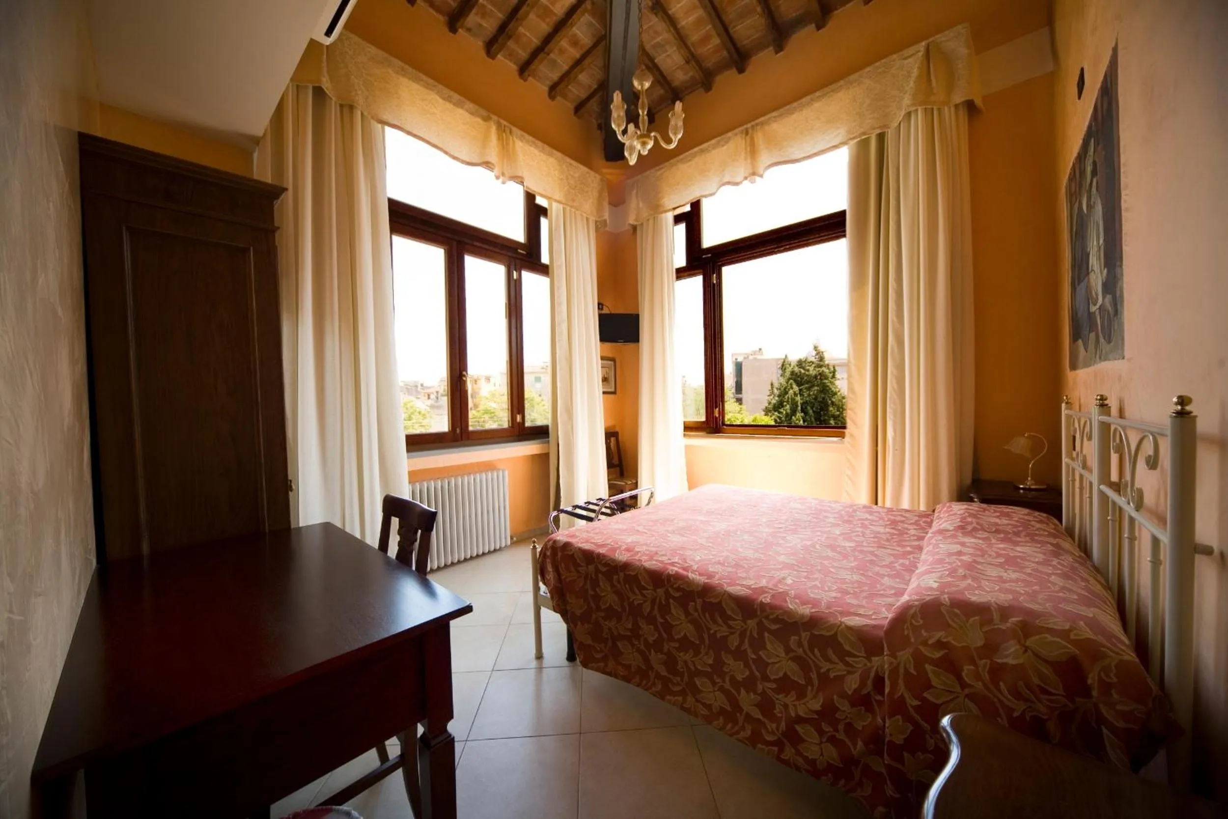 Bed in Hotel Merlini