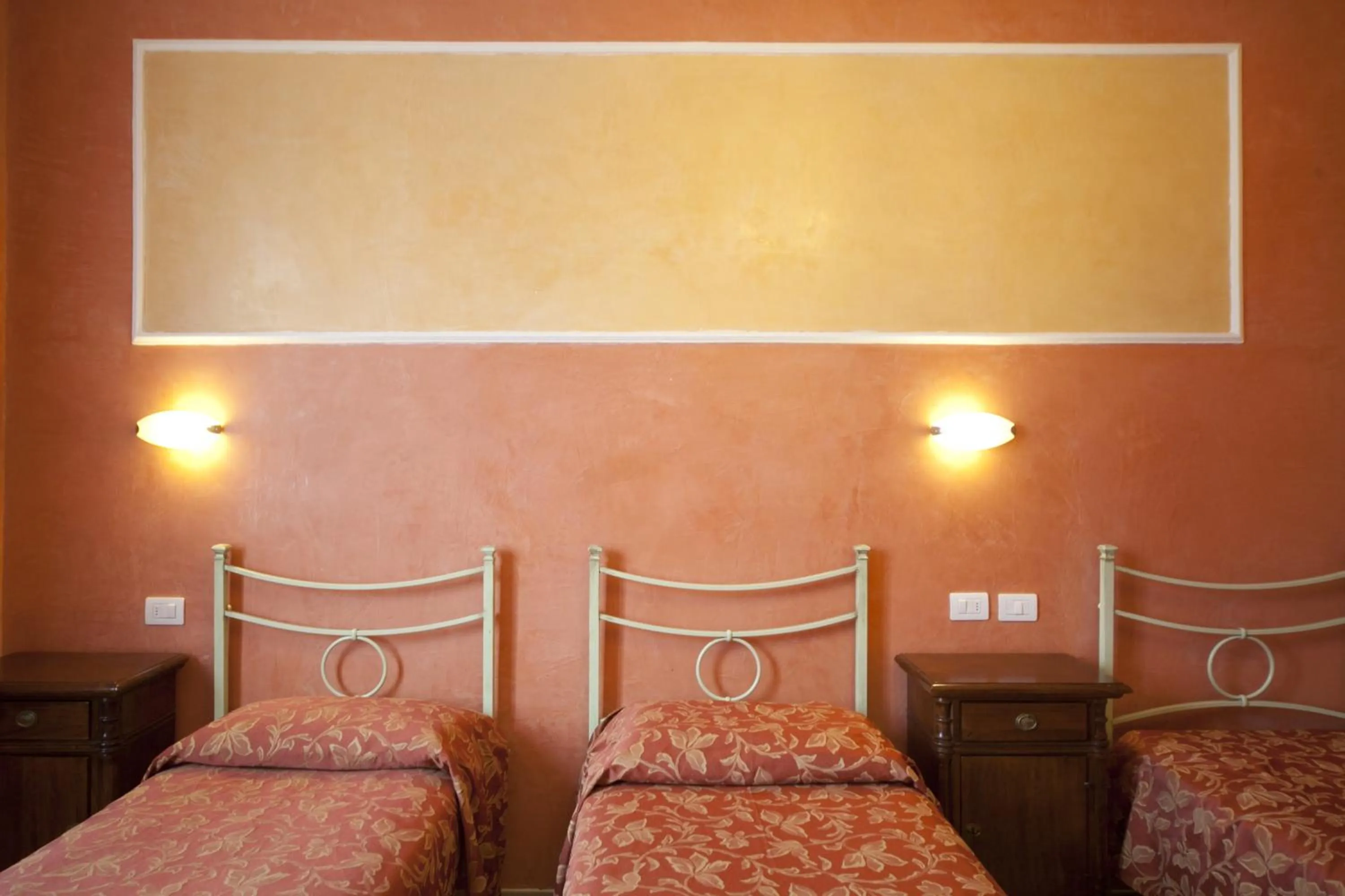 Bed in Hotel Merlini