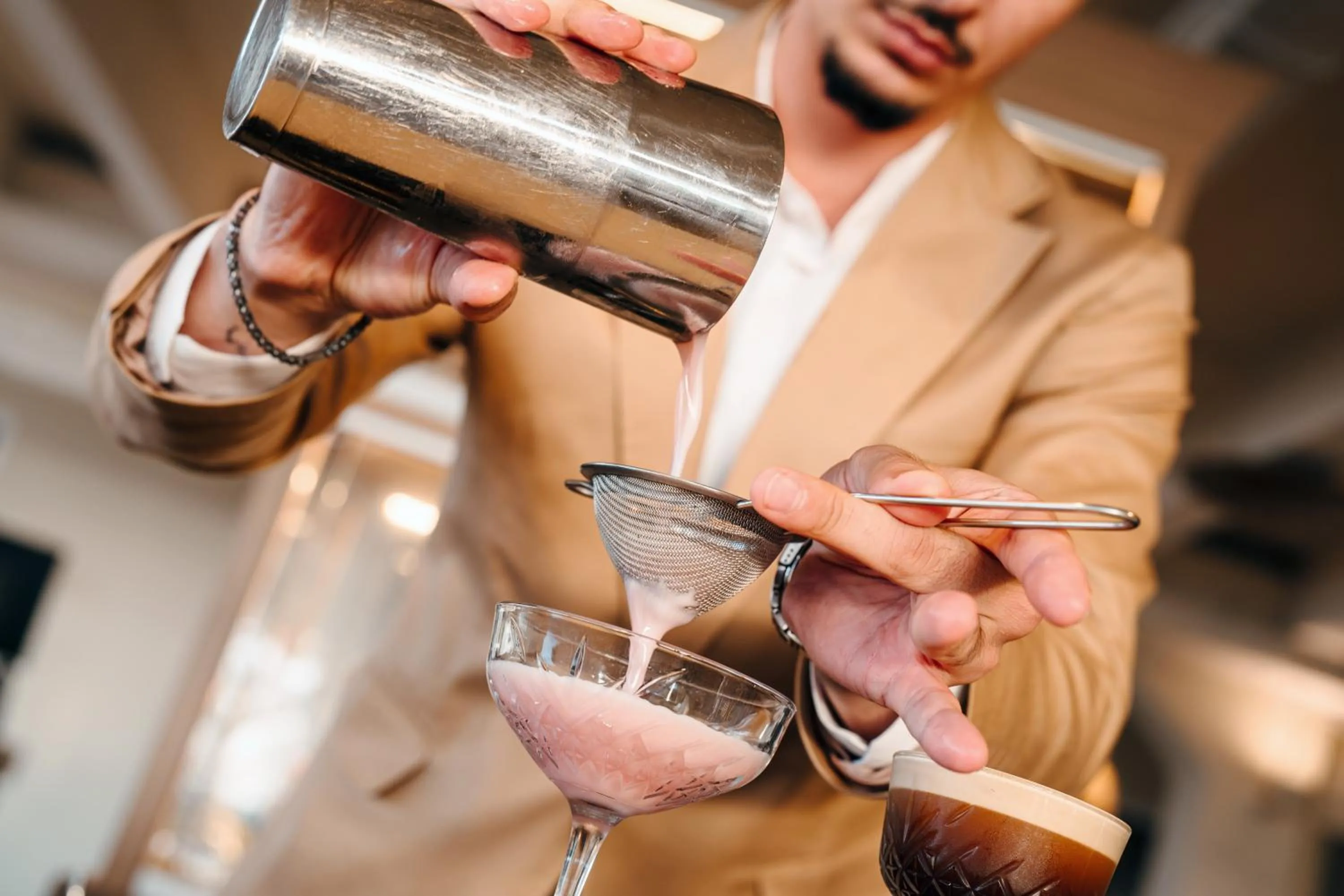 Lounge or bar in Mangia's Santa Teresa Sardinia, Curio Collection by Hilton