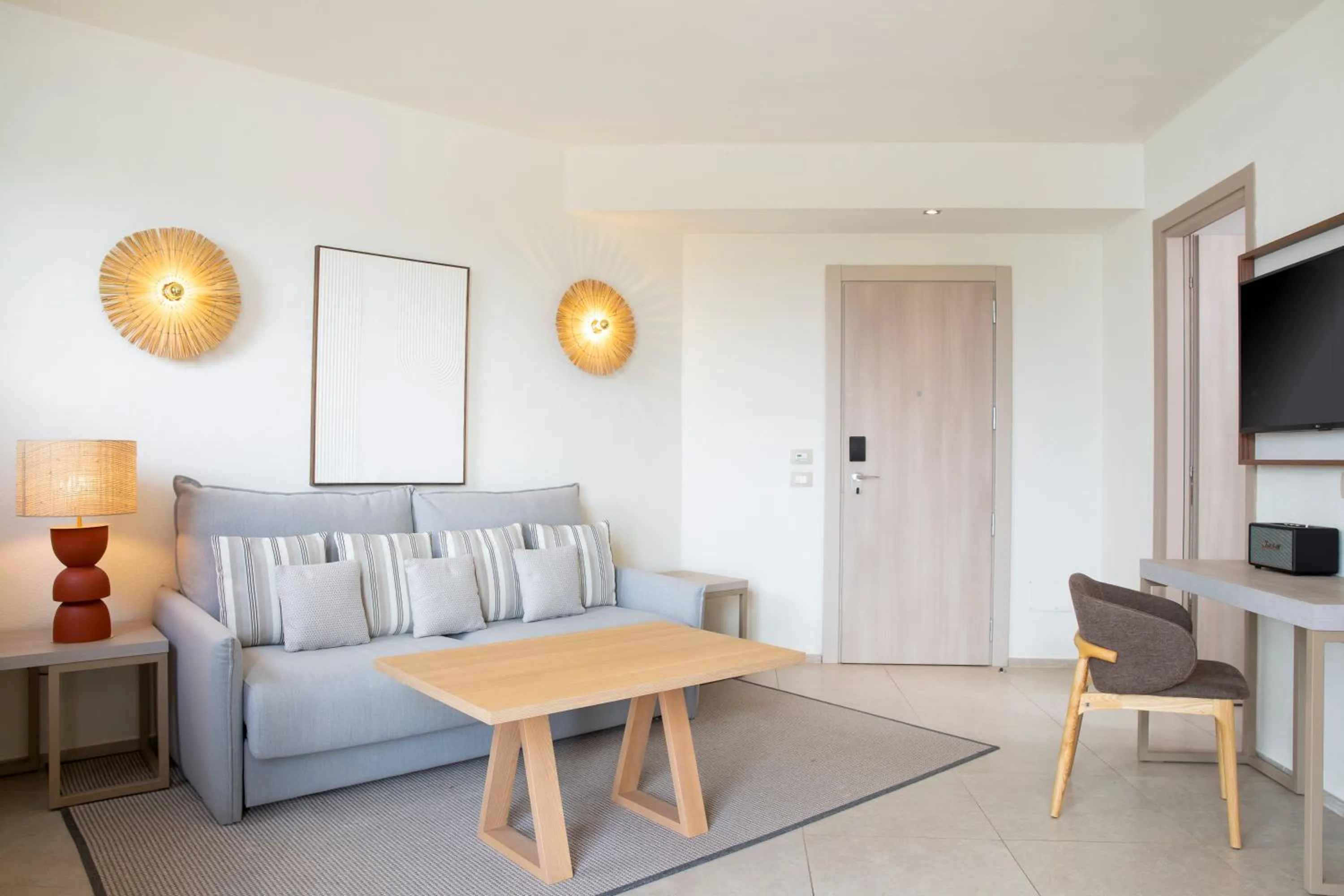 Photo of the whole room in Mangia's Santa Teresa Sardinia, Curio Collection by Hilton