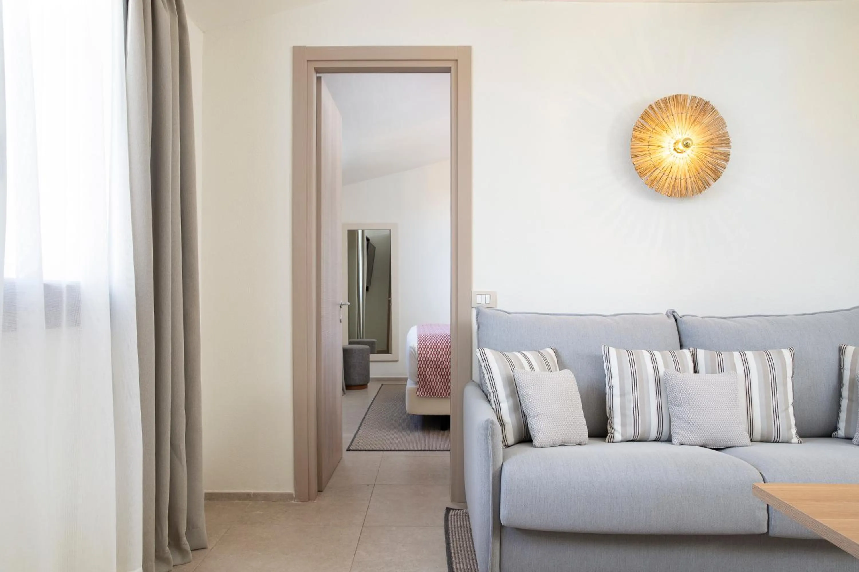 Photo of the whole room in Mangia's Santa Teresa Sardinia, Curio Collection by Hilton