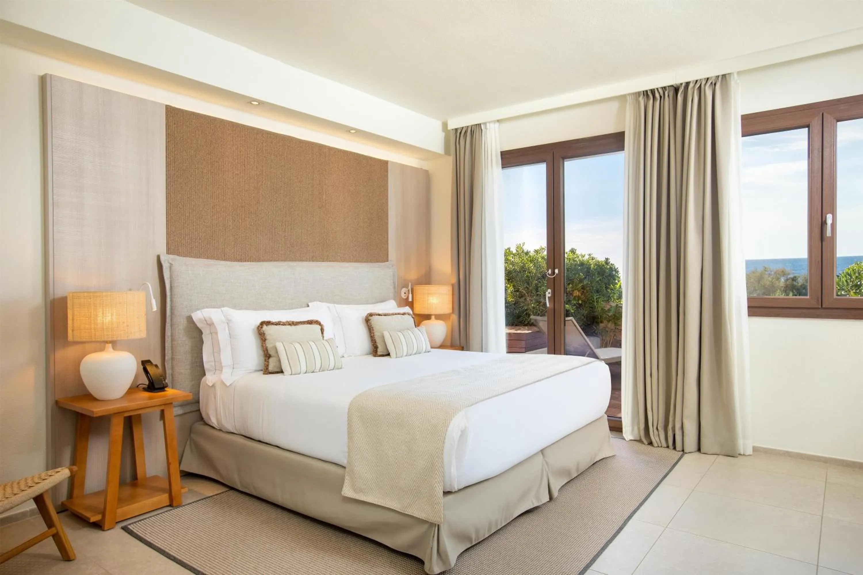 Bed in Mangia's Santa Teresa Sardinia, Curio Collection by Hilton