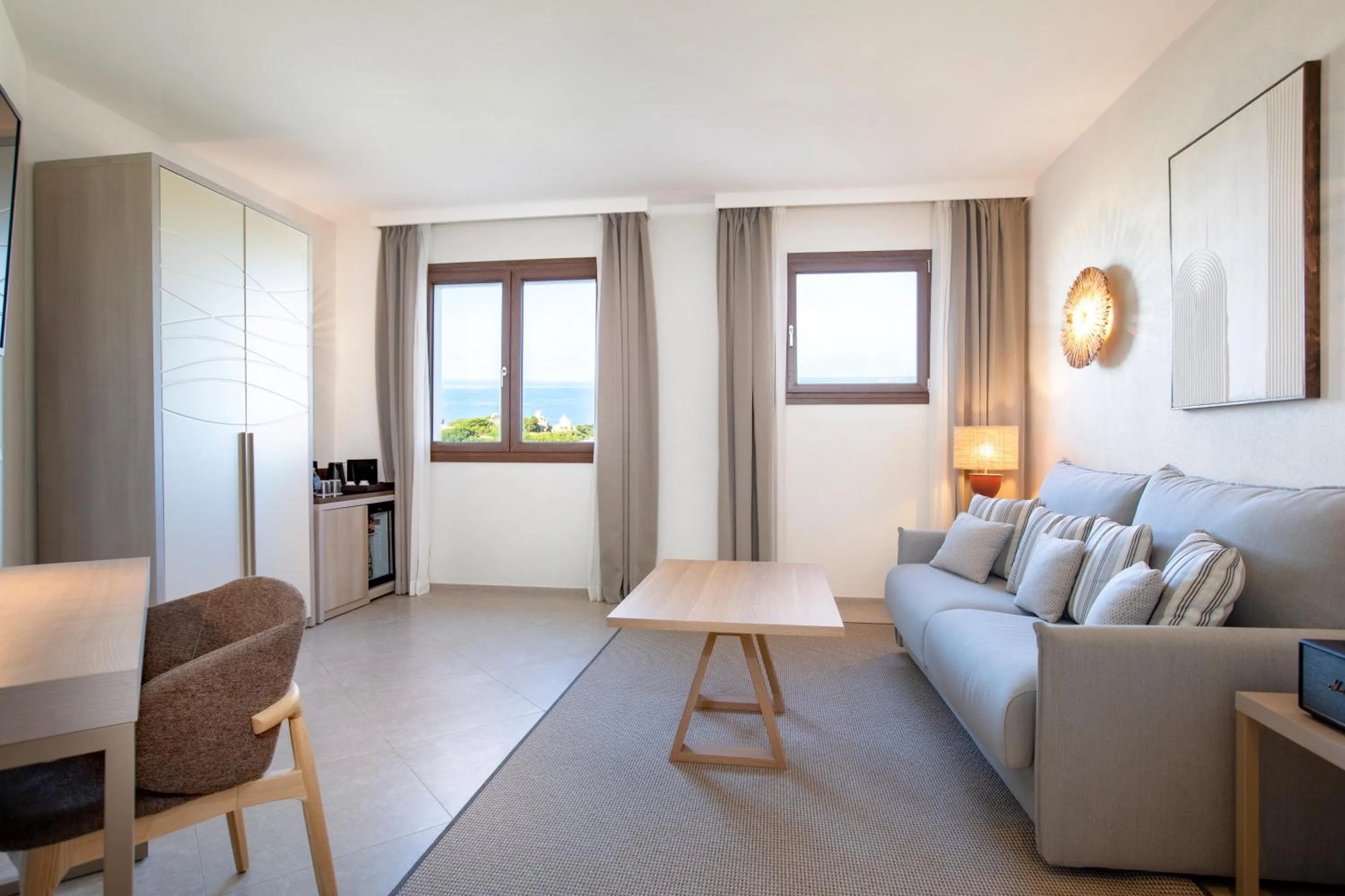 Photo of the whole room in Mangia's Santa Teresa Sardinia, Curio Collection by Hilton