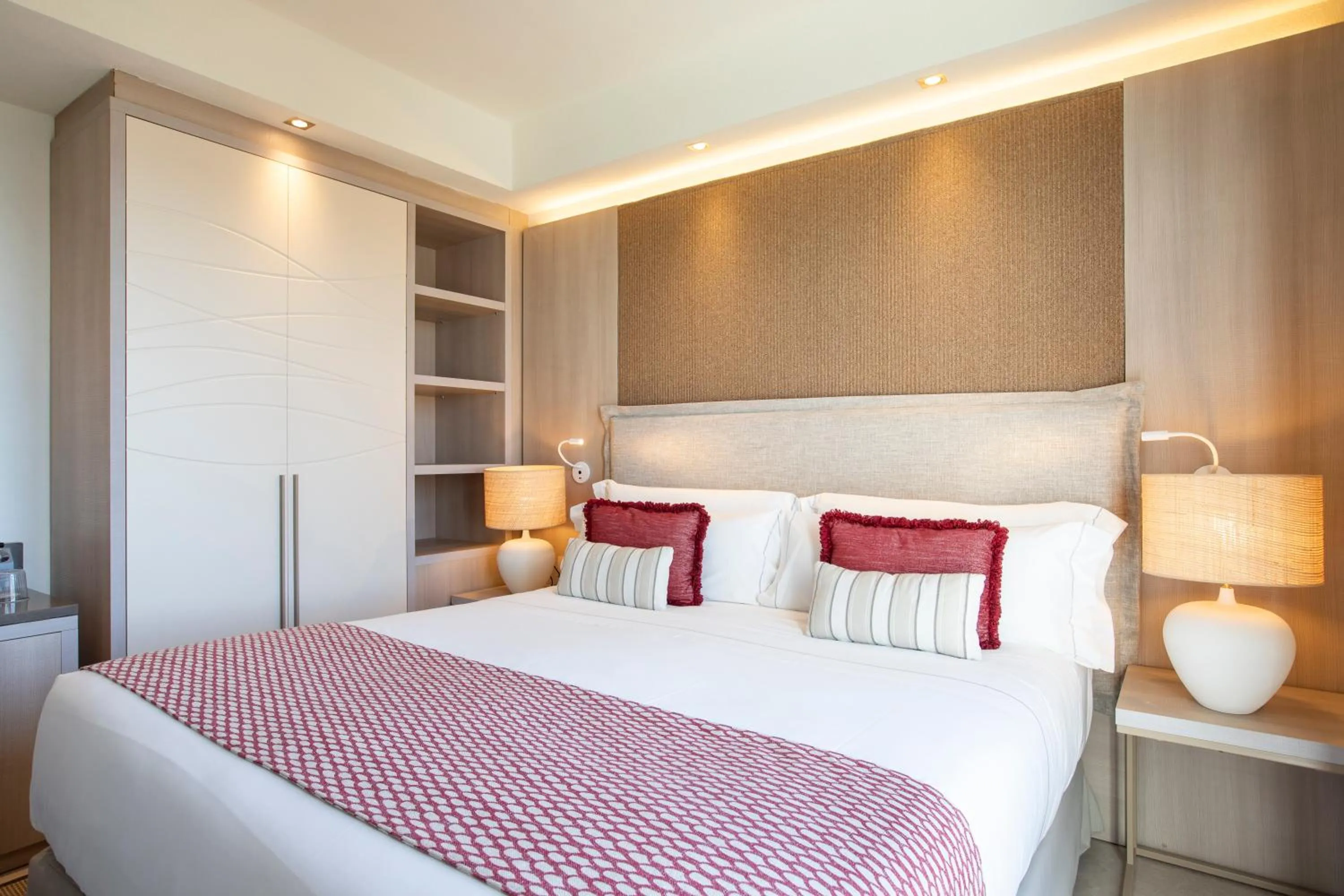 Bed in Mangia's Santa Teresa Sardinia, Curio Collection by Hilton