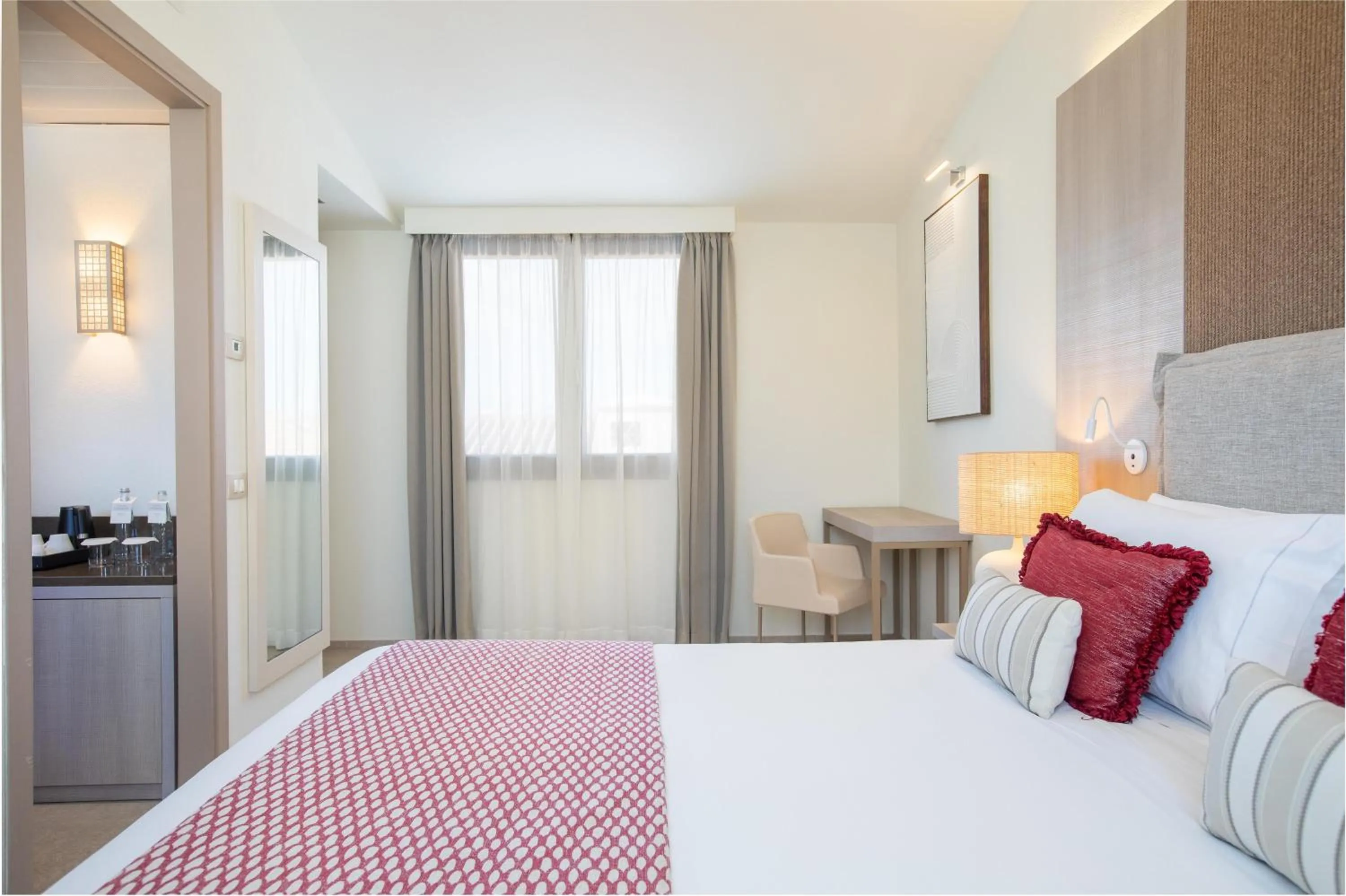 Bed in Mangia's Santa Teresa Sardinia, Curio Collection by Hilton