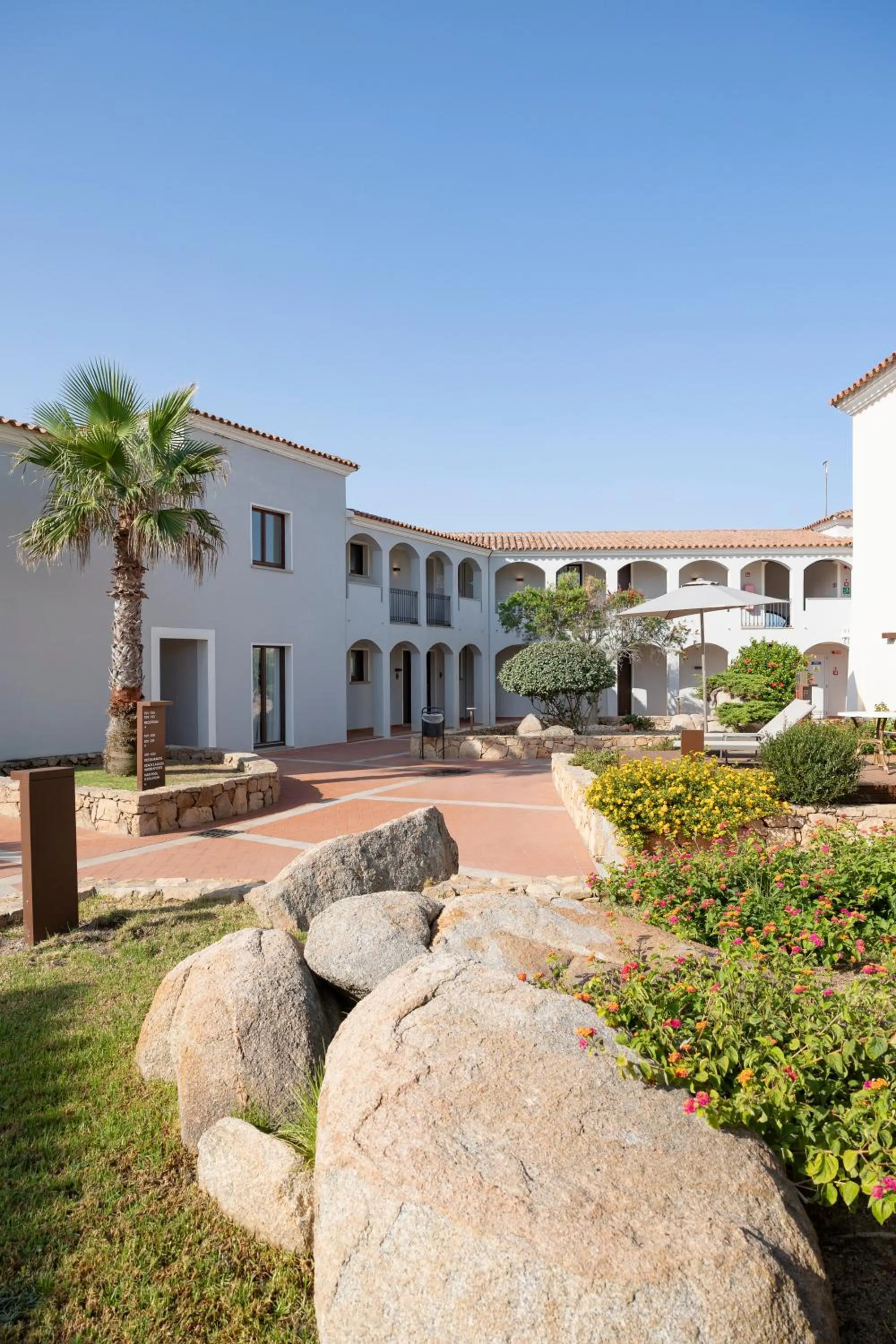 Property building in Mangia's Santa Teresa Sardinia, Curio Collection by Hilton