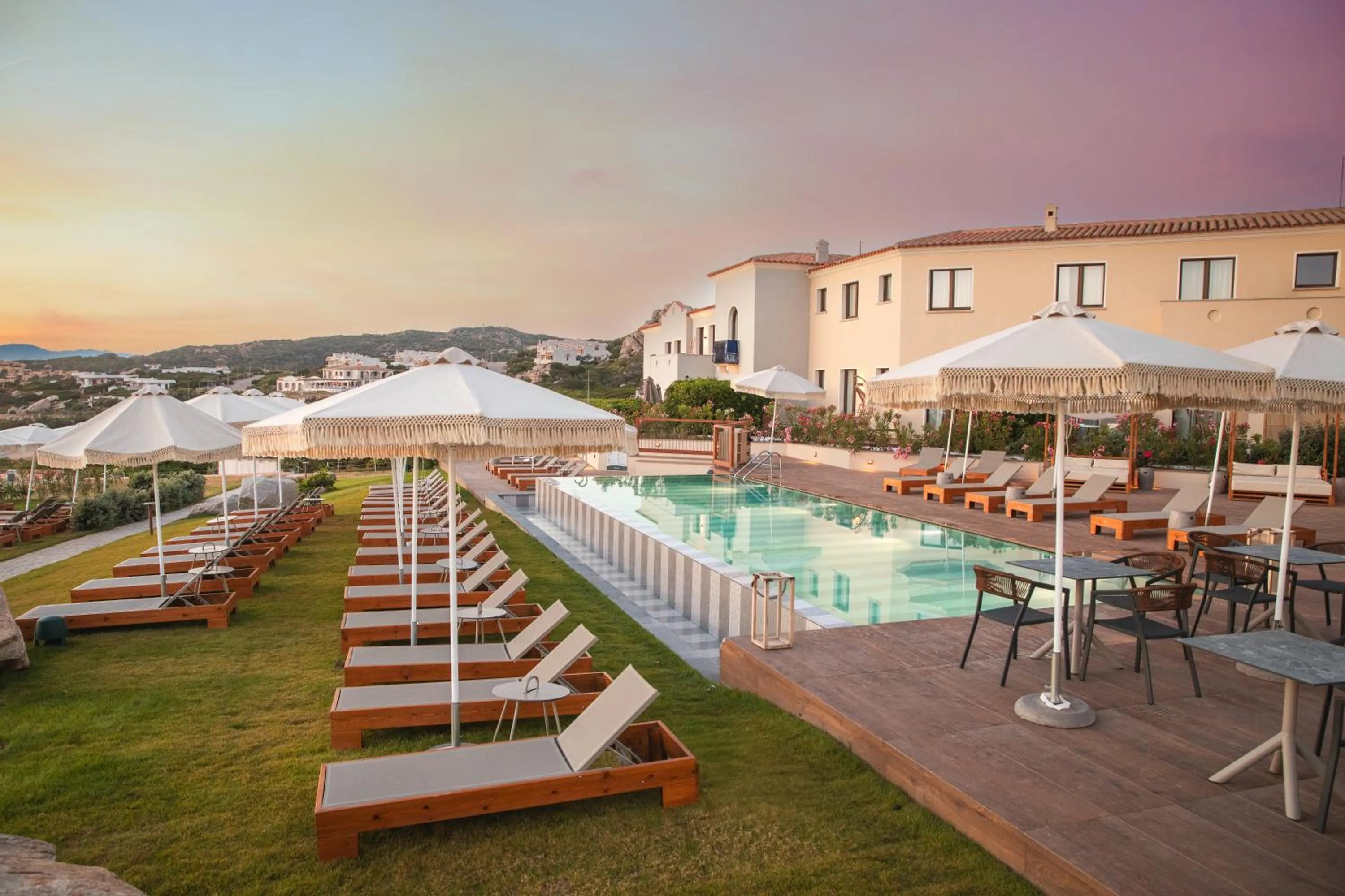 Swimming pool in Mangia's Santa Teresa Sardinia, Curio Collection by Hilton