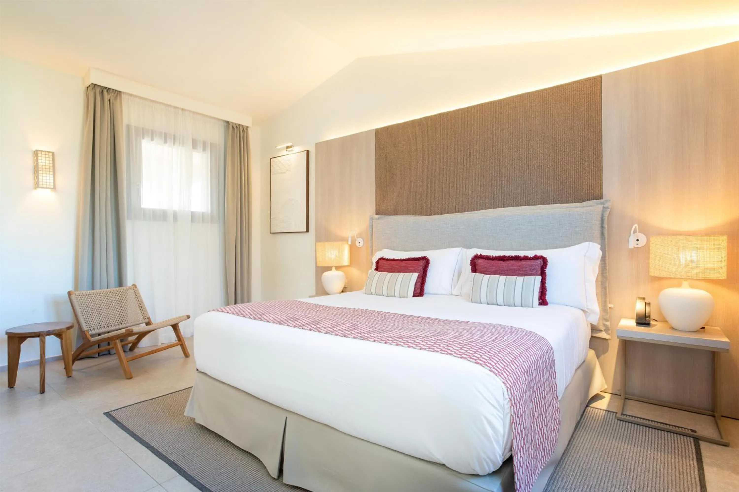 Bed in Mangia's Santa Teresa Sardinia, Curio Collection by Hilton