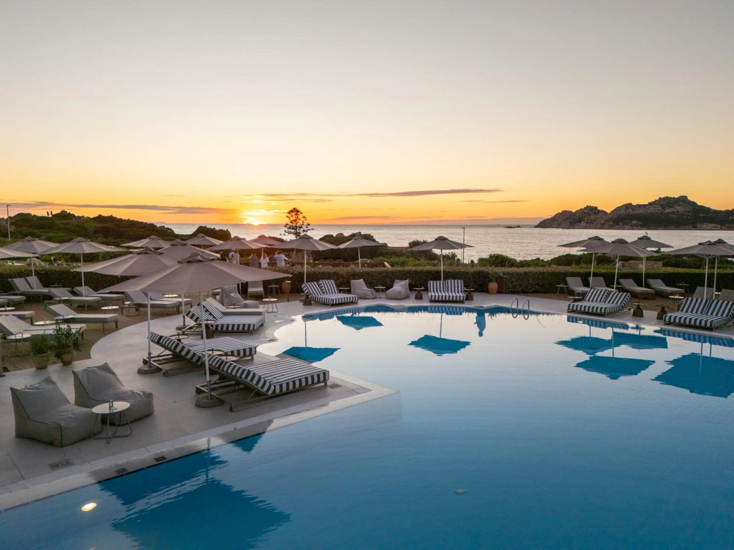 Swimming pool in Mangia's Santa Teresa Sardinia, Curio Collection by Hilton