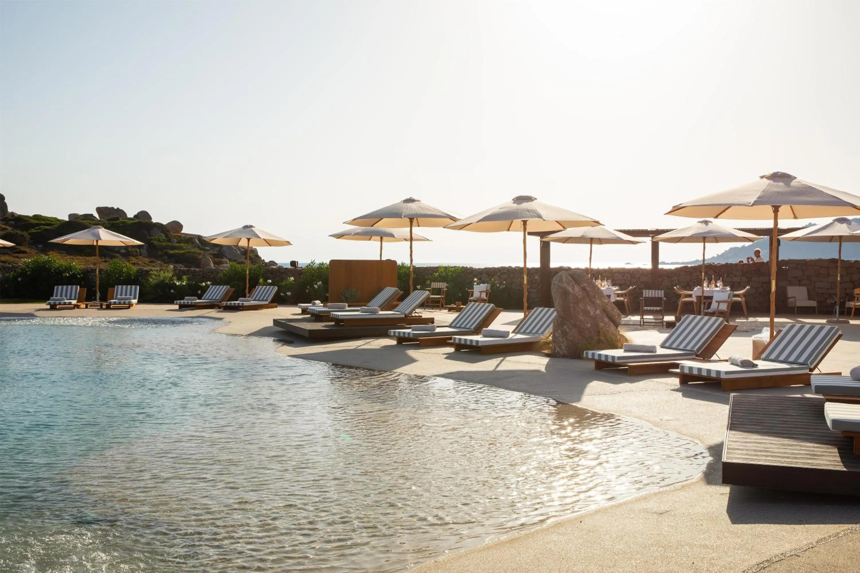 Pool view in Mangia's Santa Teresa Sardinia, Curio Collection by Hilton