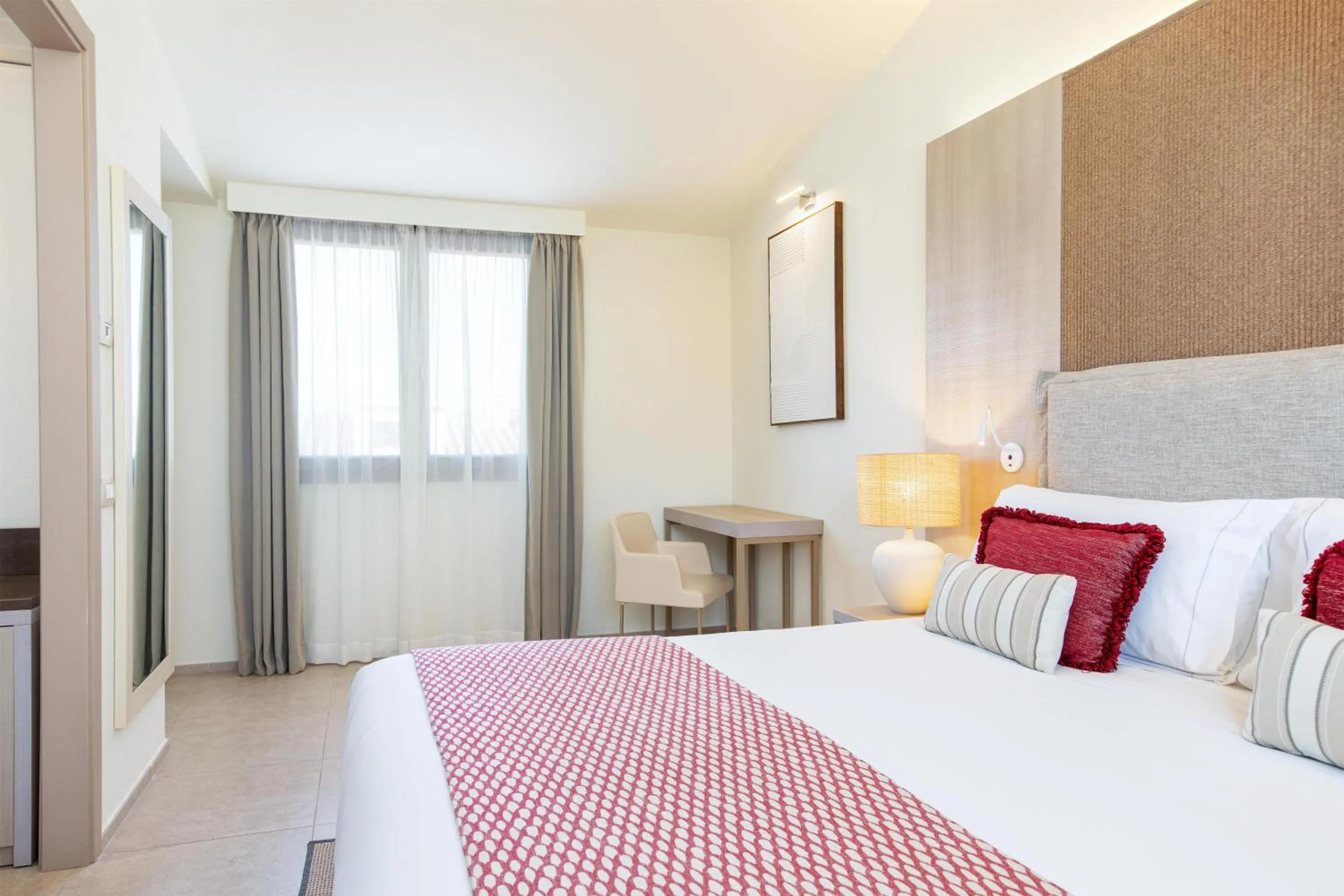 Bed in Mangia's Santa Teresa Sardinia, Curio Collection by Hilton