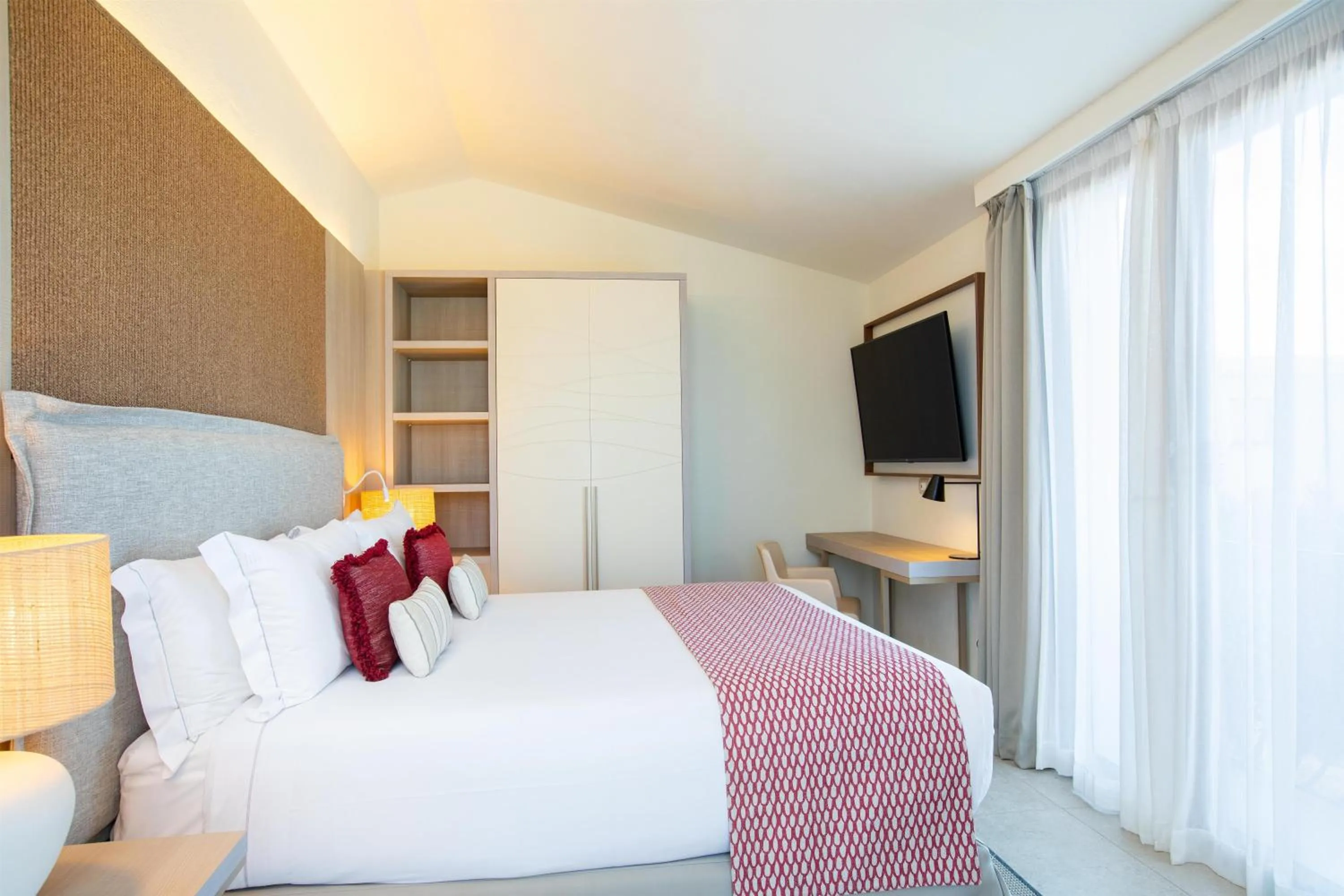 Bed in Mangia's Santa Teresa Sardinia, Curio Collection by Hilton