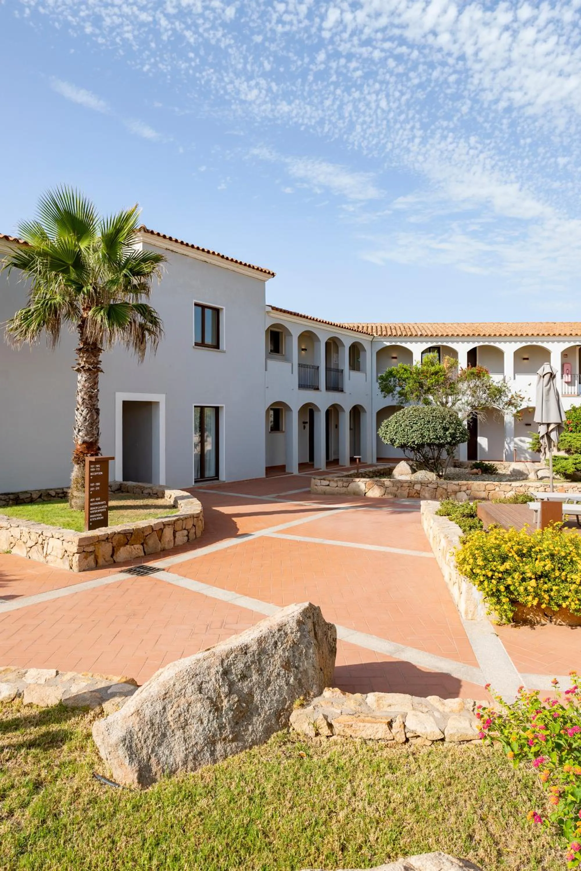 Property building in Mangia's Santa Teresa Sardinia, Curio Collection by Hilton