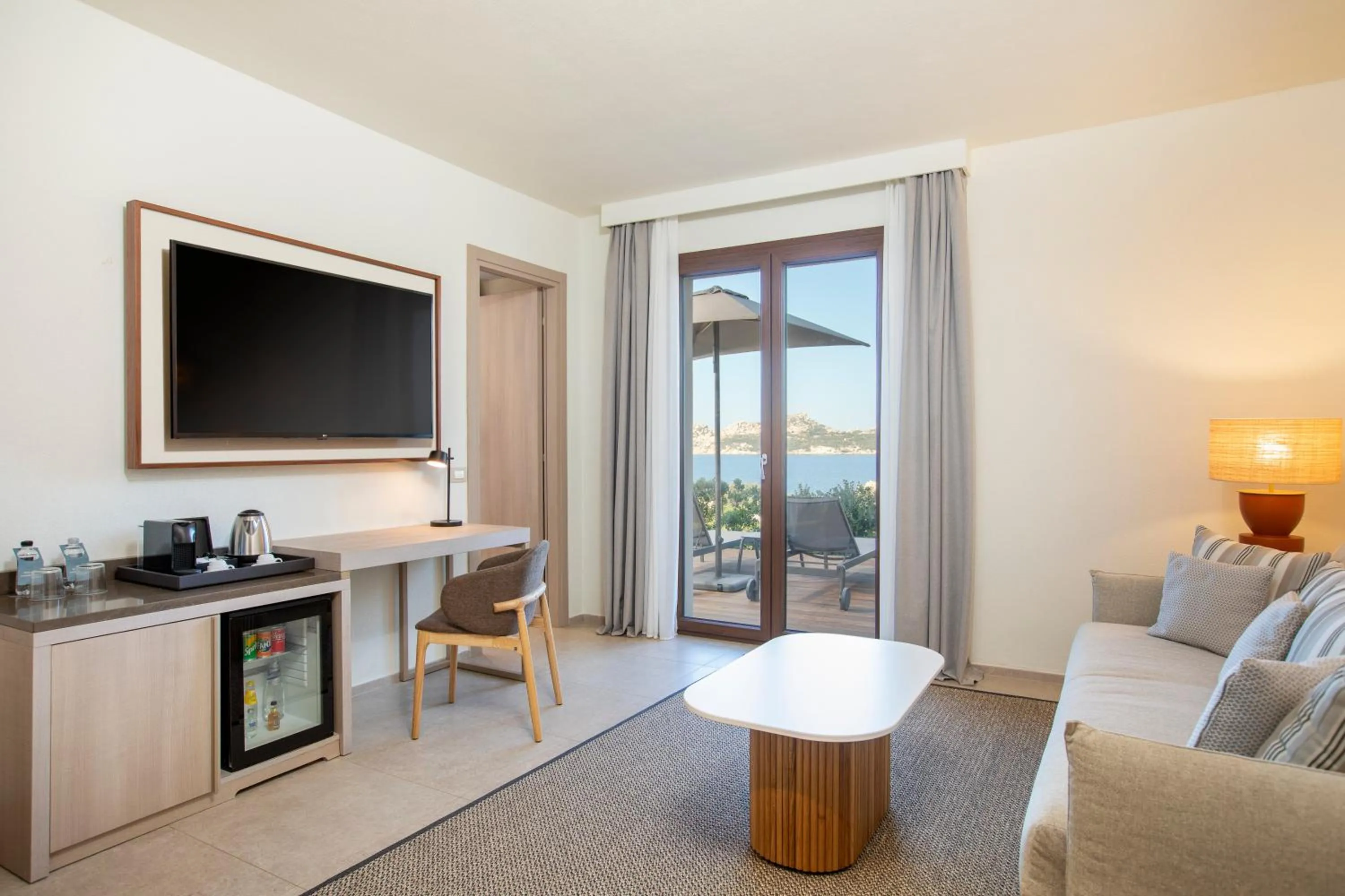 Photo of the whole room in Mangia's Santa Teresa Sardinia, Curio Collection by Hilton