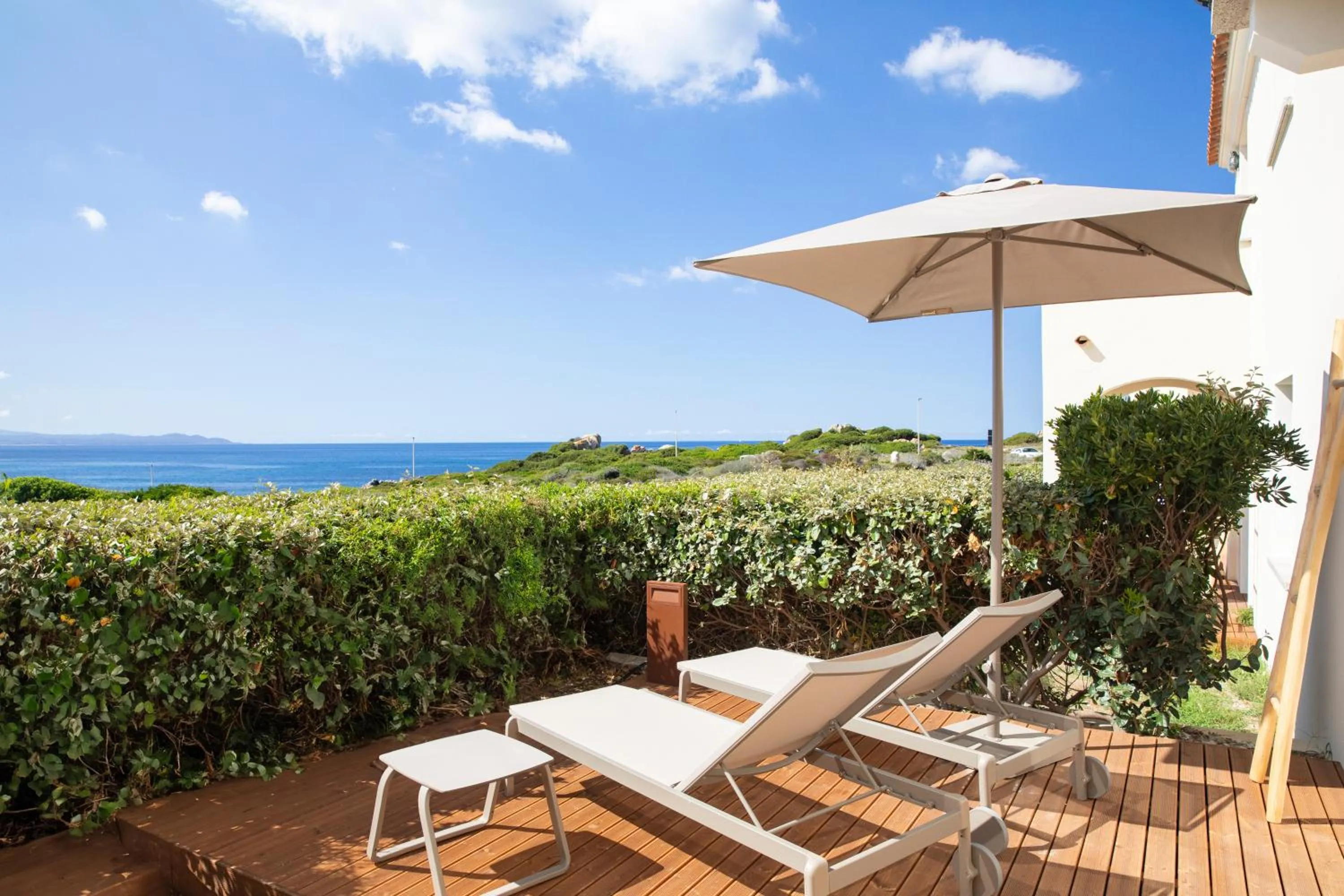 Balcony/Terrace in Mangia's Santa Teresa Sardinia, Curio Collection by Hilton