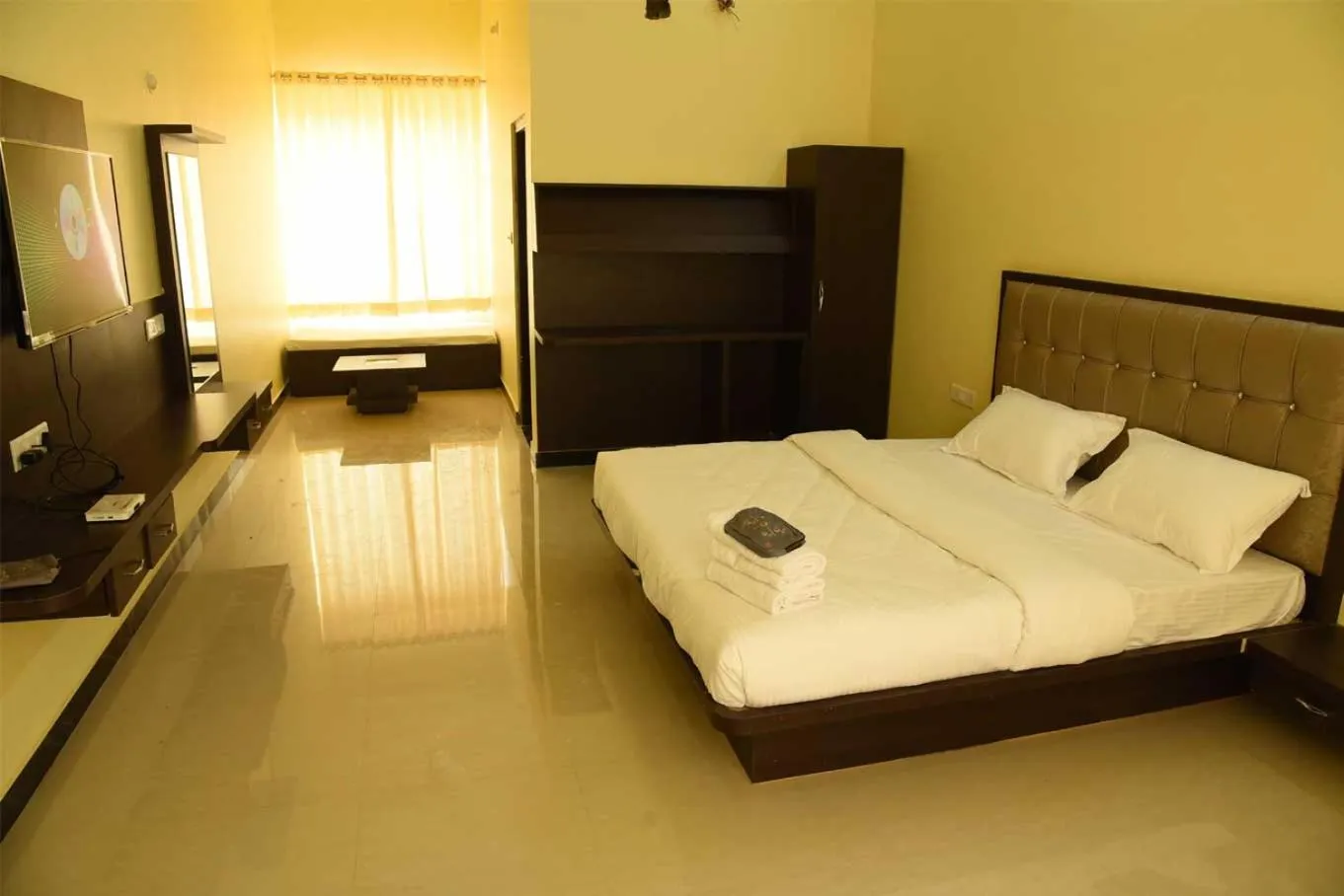 Bed in Chitrakoot Garden and Resorts