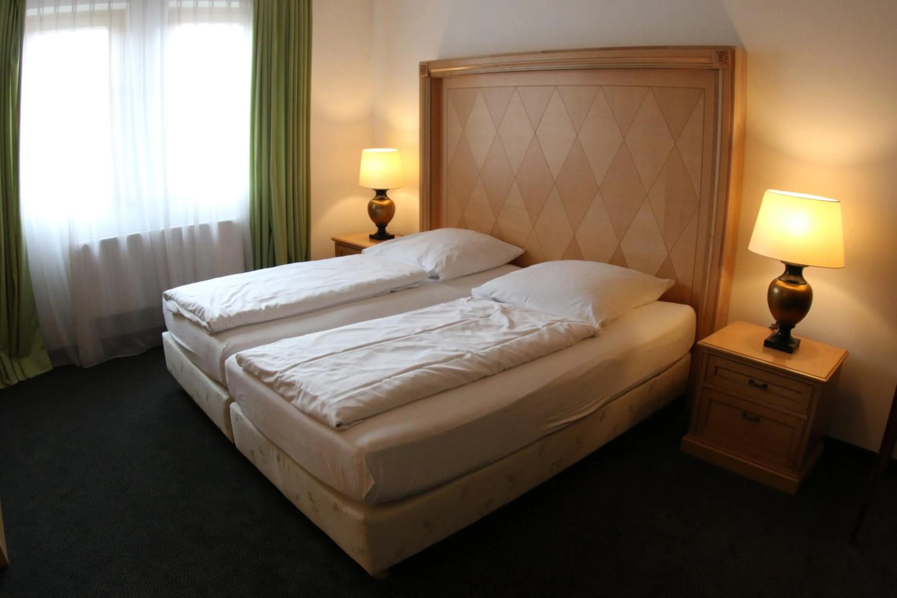 Photo of the whole room, Bed in Gästehaus Bavaria