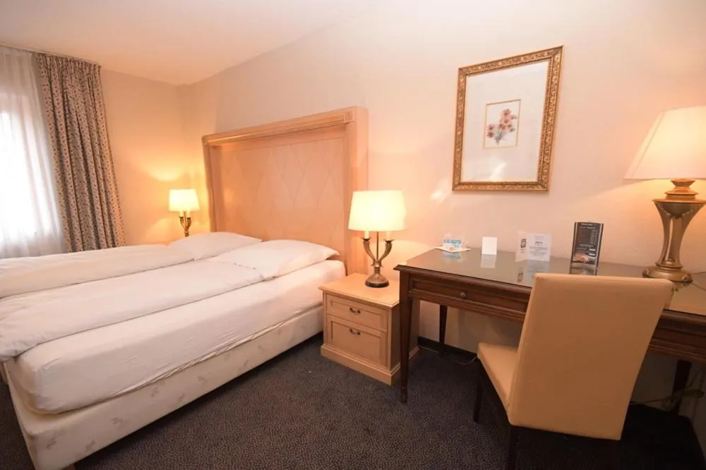 Photo of the whole room, Bed in Gästehaus Bavaria