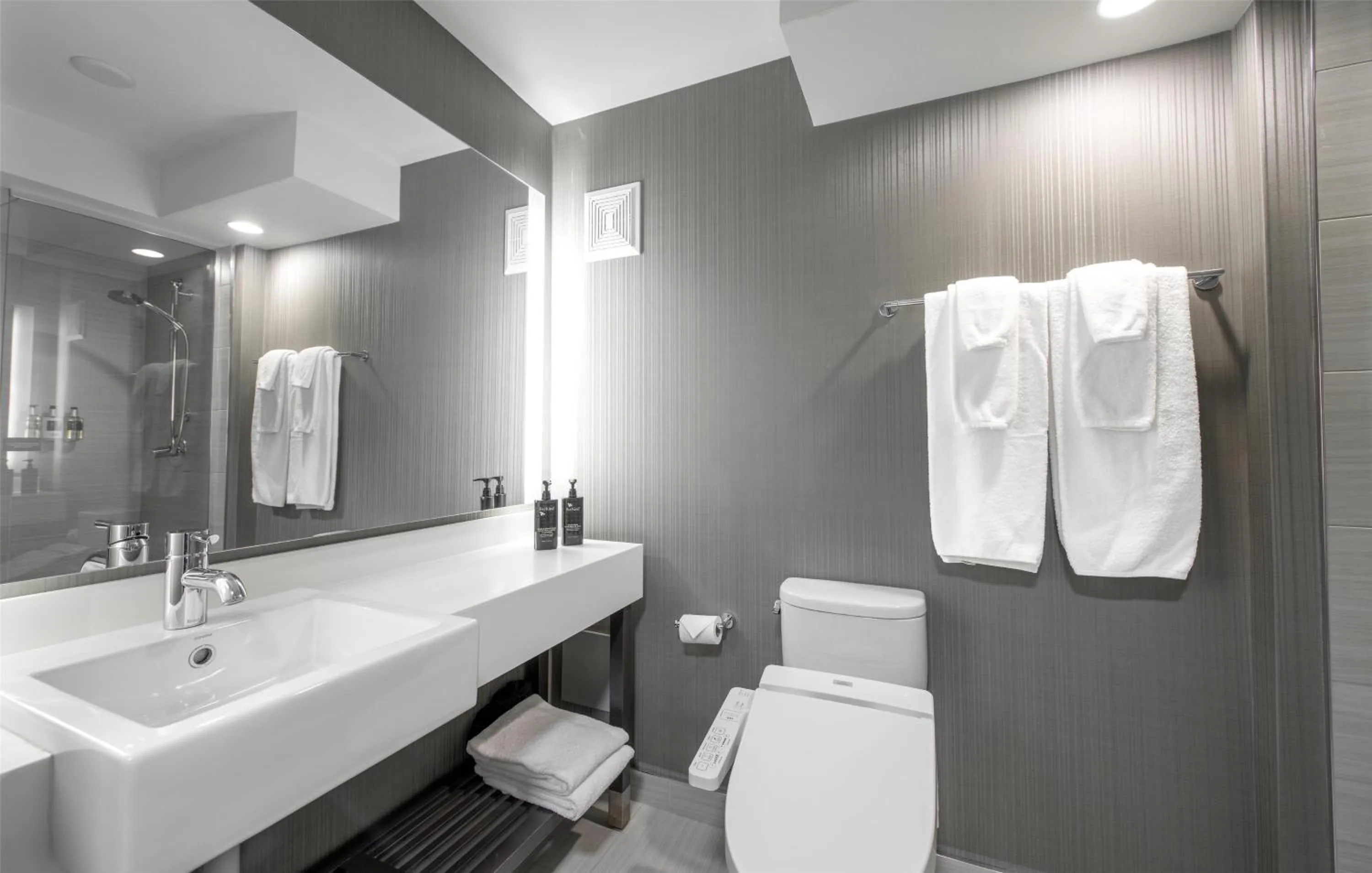 Bathroom in Coast Prince George Hotel by APA