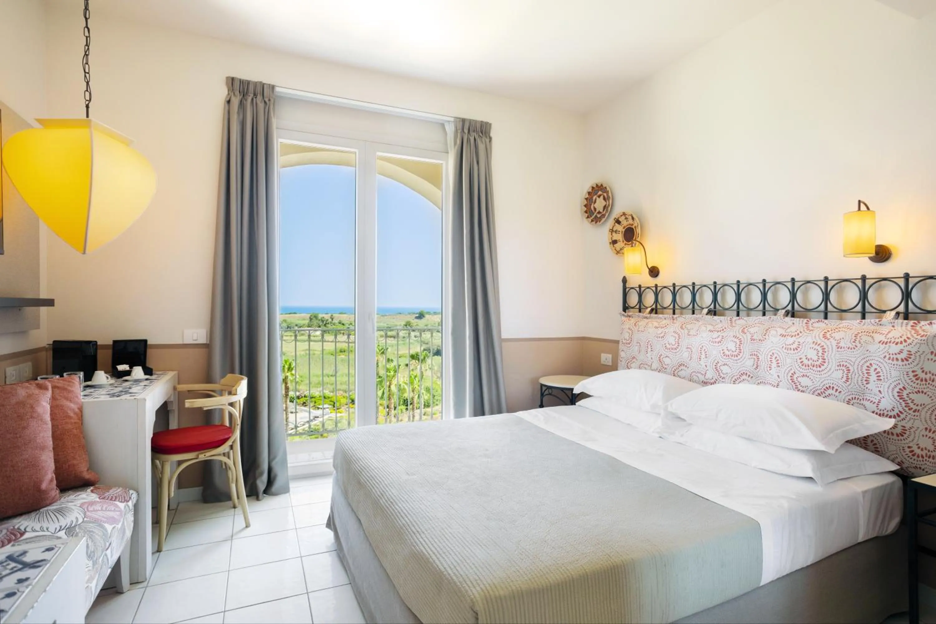 View (from property/room), Bed in Mangia's Selinunte Resort