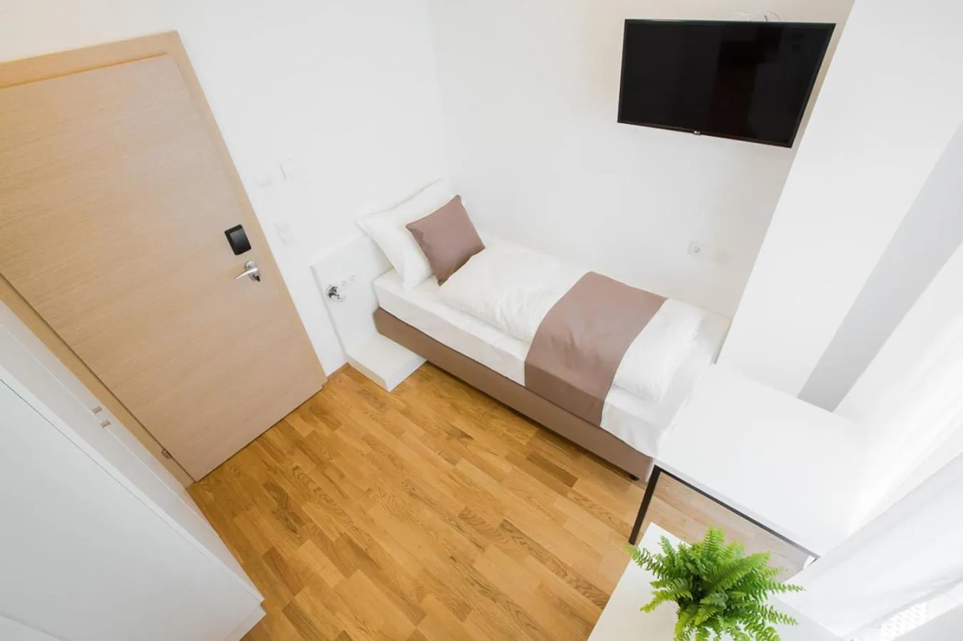 Bed in SHOME Hotel Graz I Self-Check-In I Free Parking