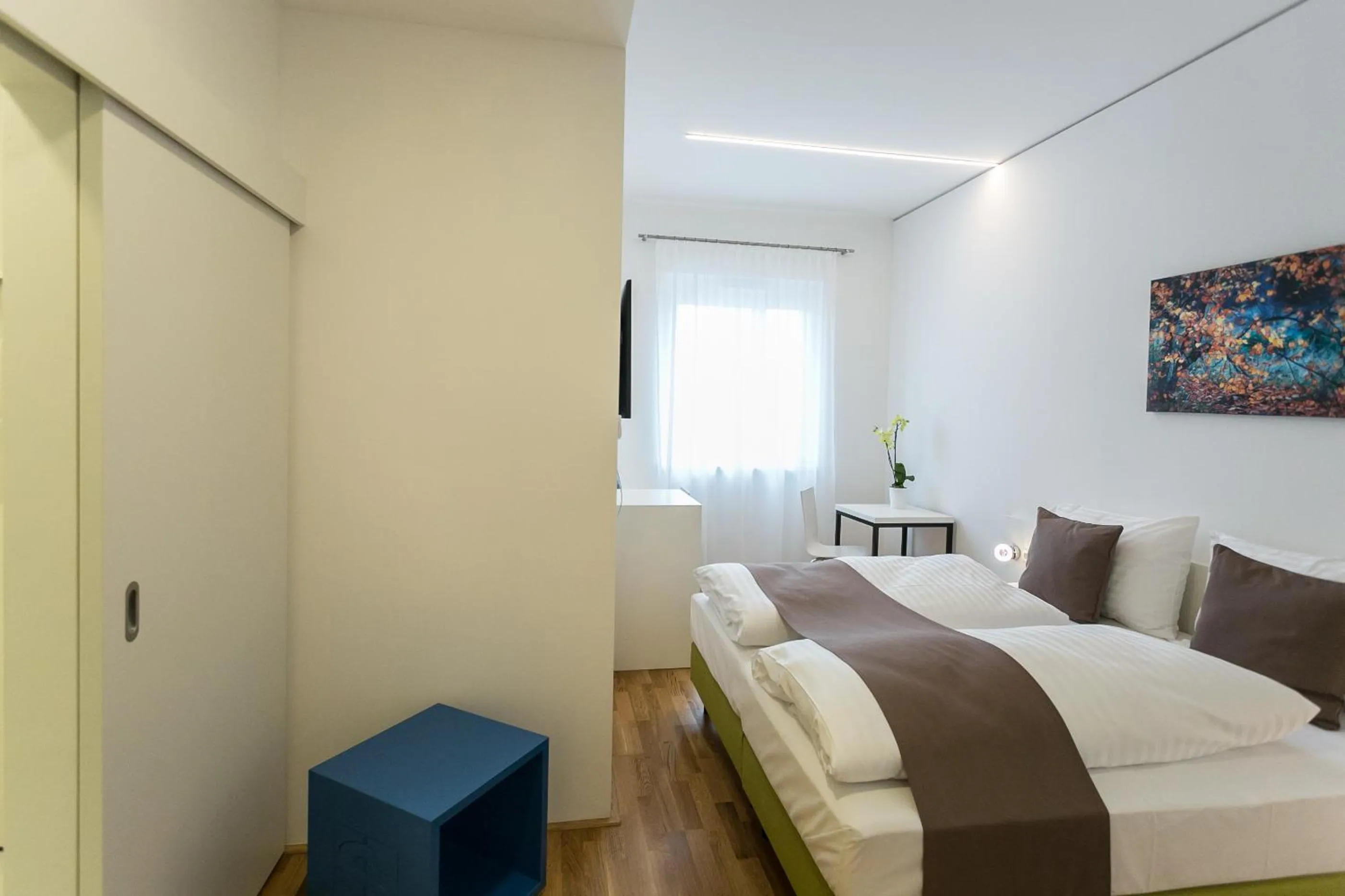 Bed in SHOME Hotel Graz I Self-Check-In I Free Parking