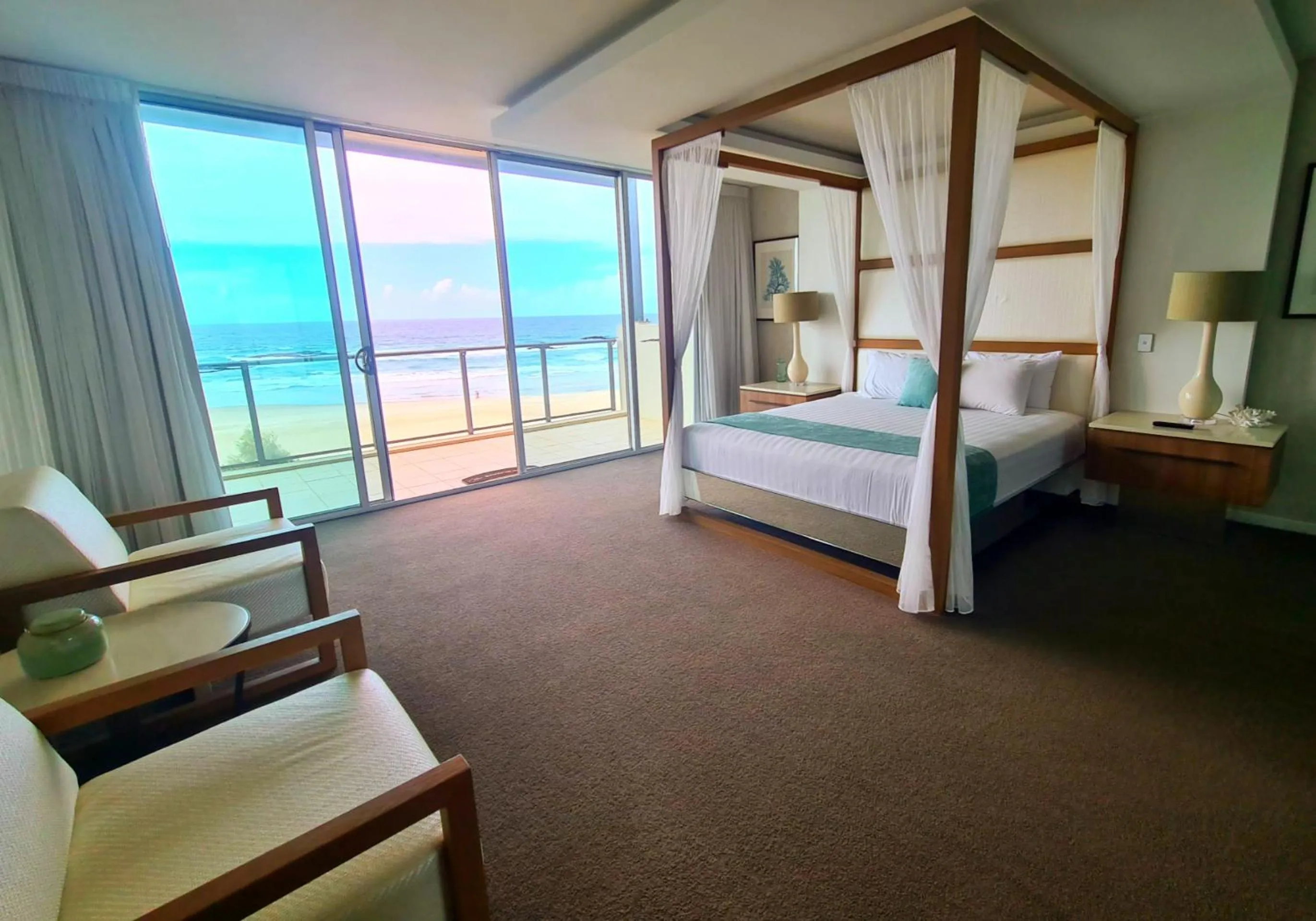 Seating area, Bed in The Beach Cabarita