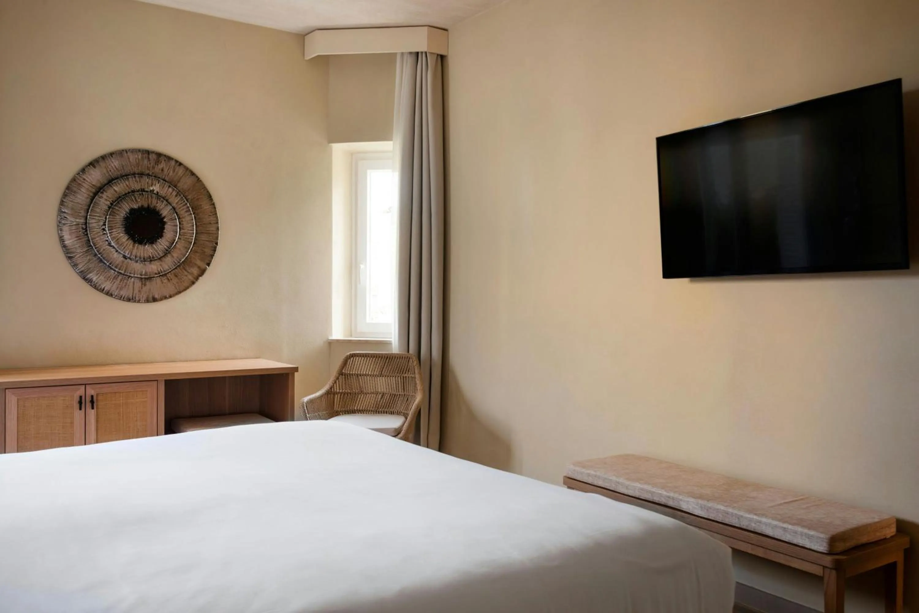 Photo of the whole room, Bed in Mangia's Brucoli, Sicily, Autograph Collection