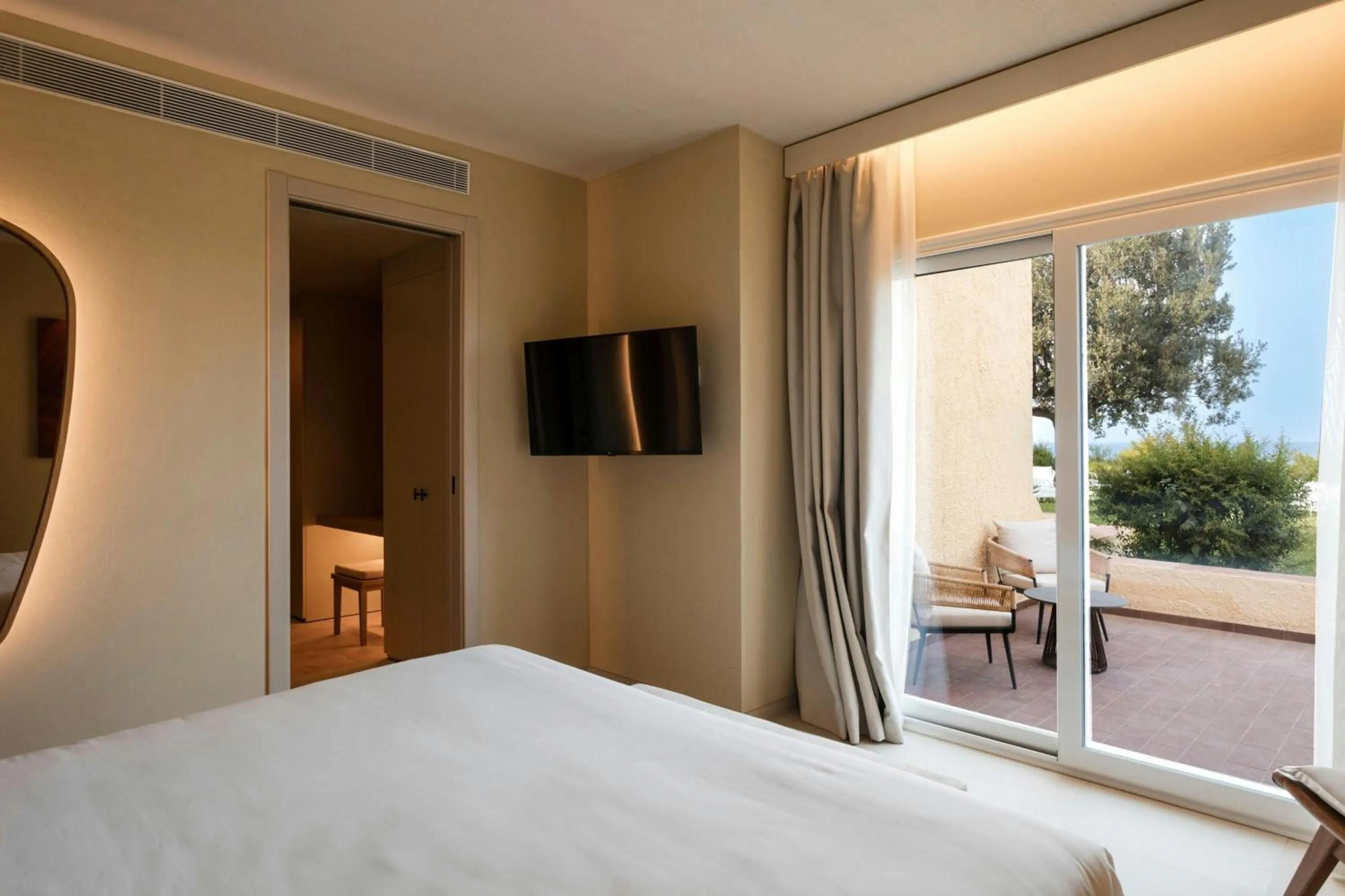 Photo of the whole room, Bed in Mangia's Brucoli, Sicily, Autograph Collection