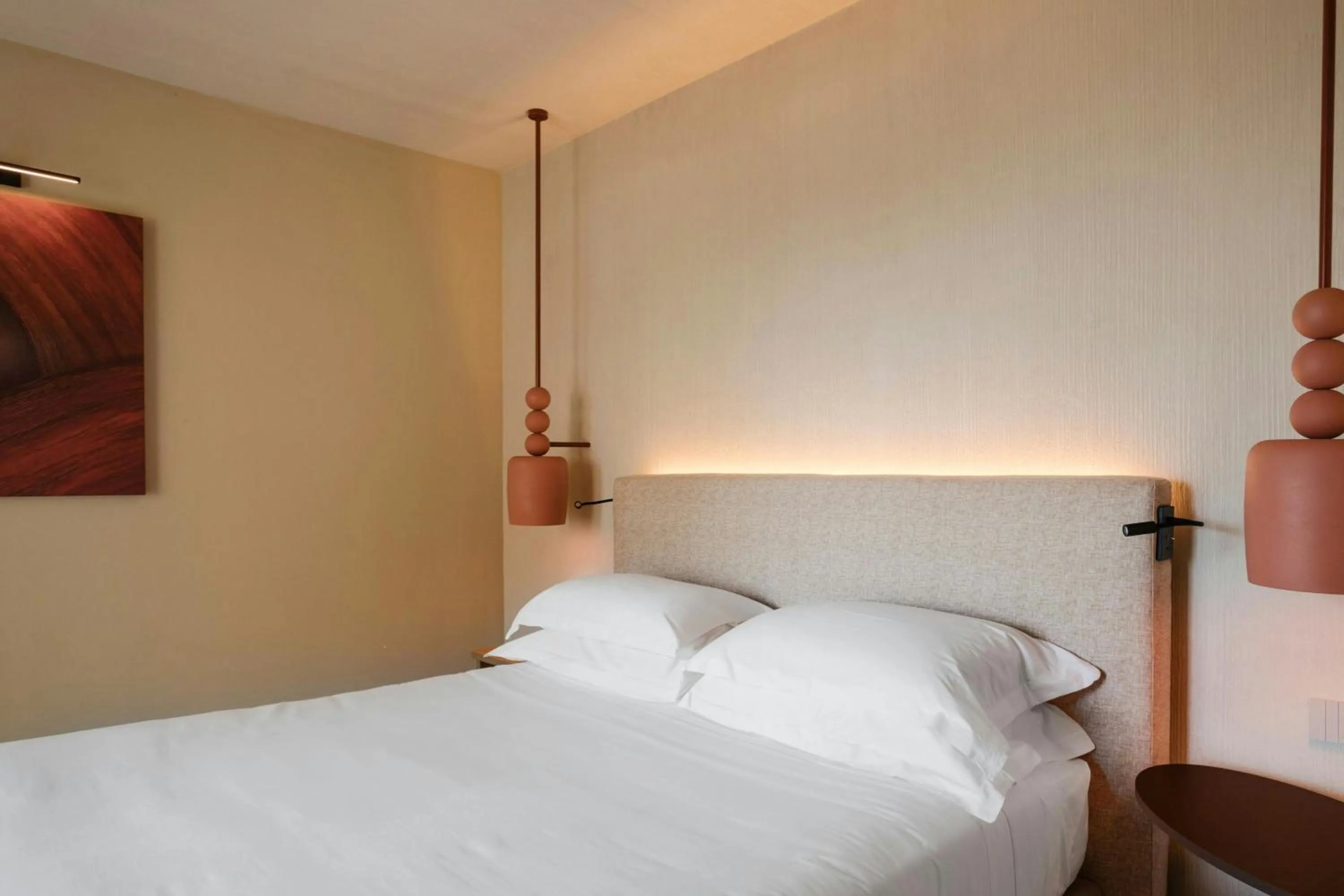 Photo of the whole room, Bed in Mangia's Brucoli, Sicily, Autograph Collection